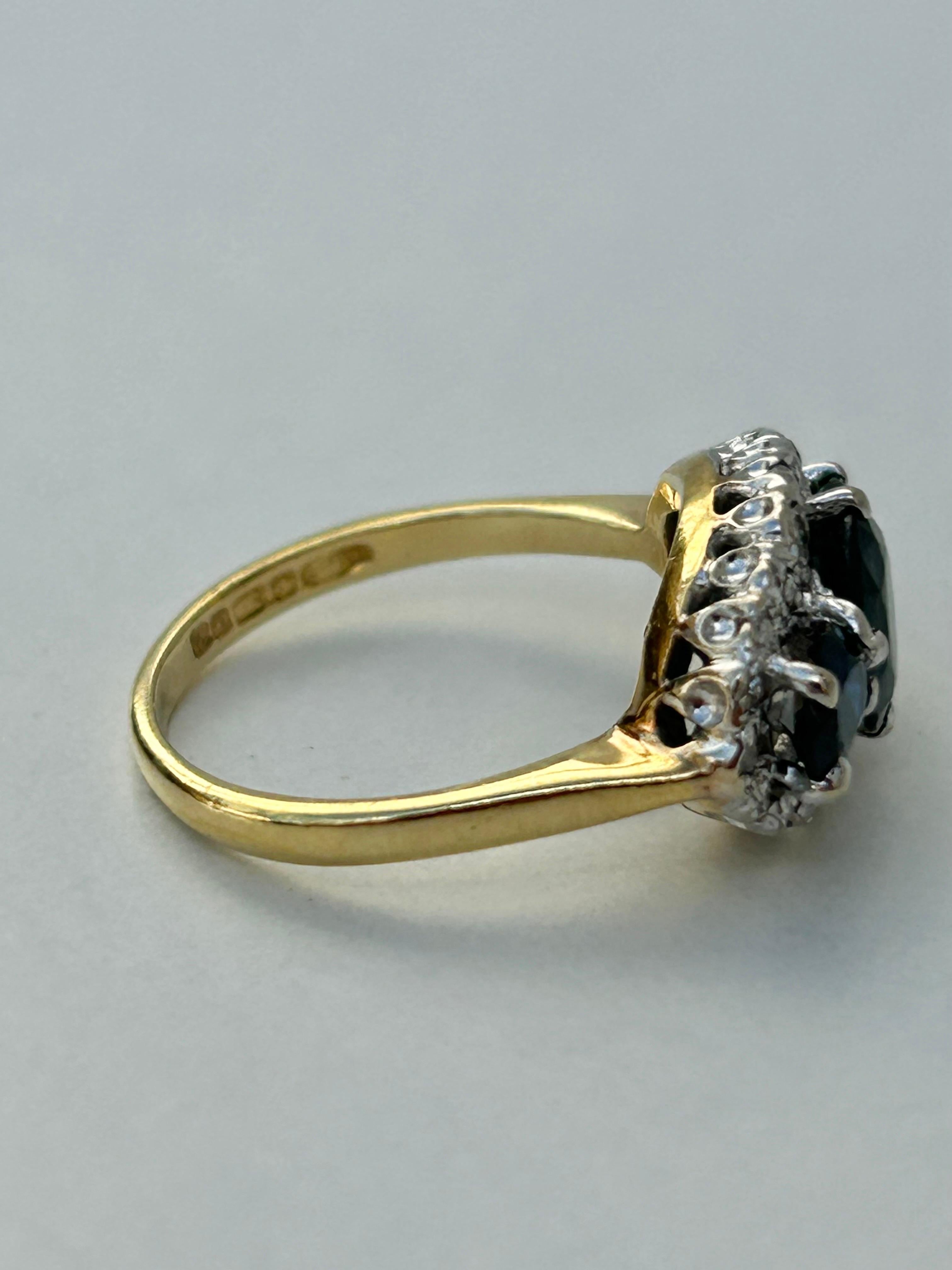 Vintage 18 Carat Yellow Gold Sapphire and Diamond Triple Halo Ring In Good Condition For Sale In Chipping Campden, GB