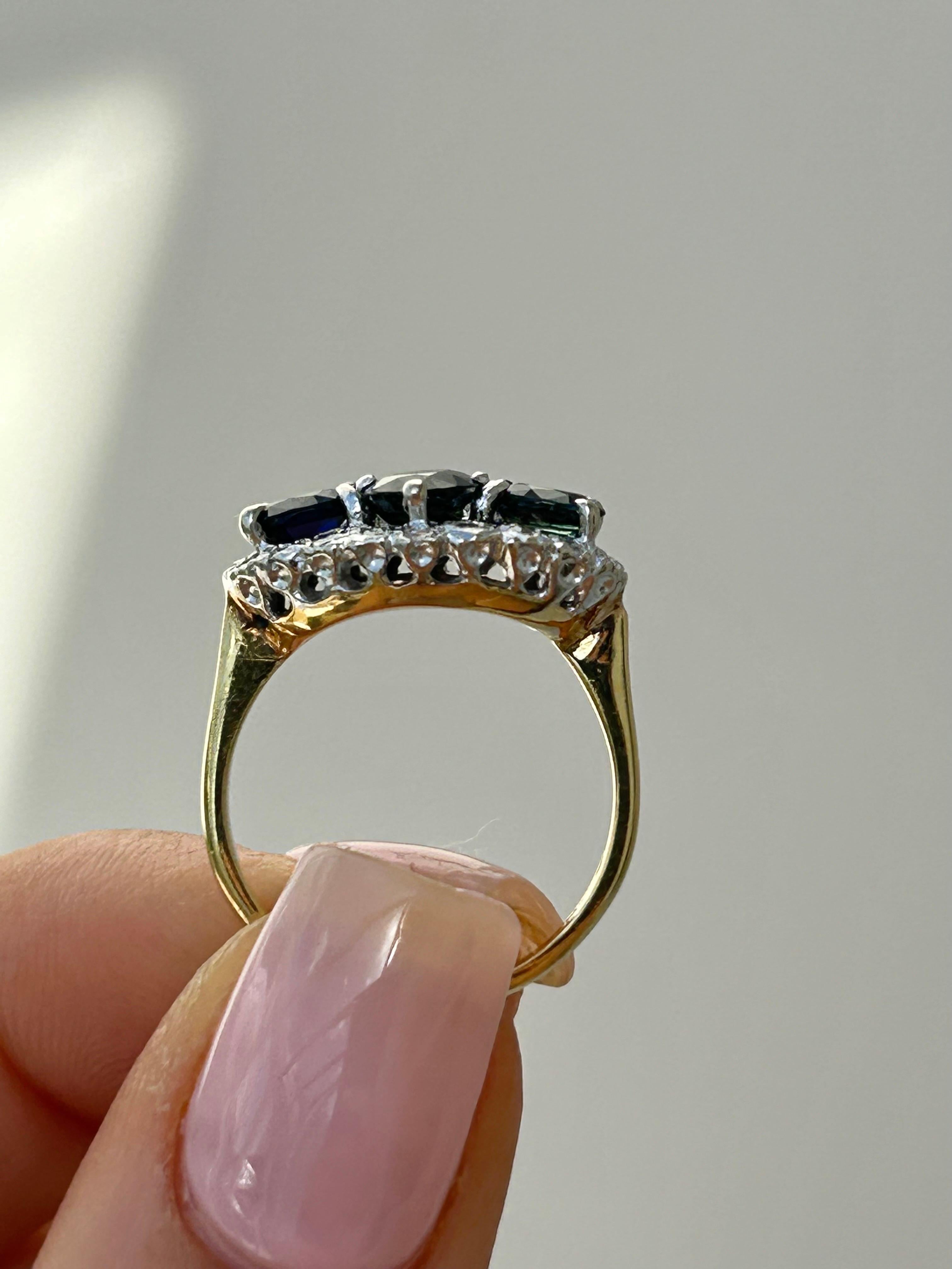 Vintage 18 Carat Yellow Gold Sapphire and Diamond Triple Halo Ring For Sale 3