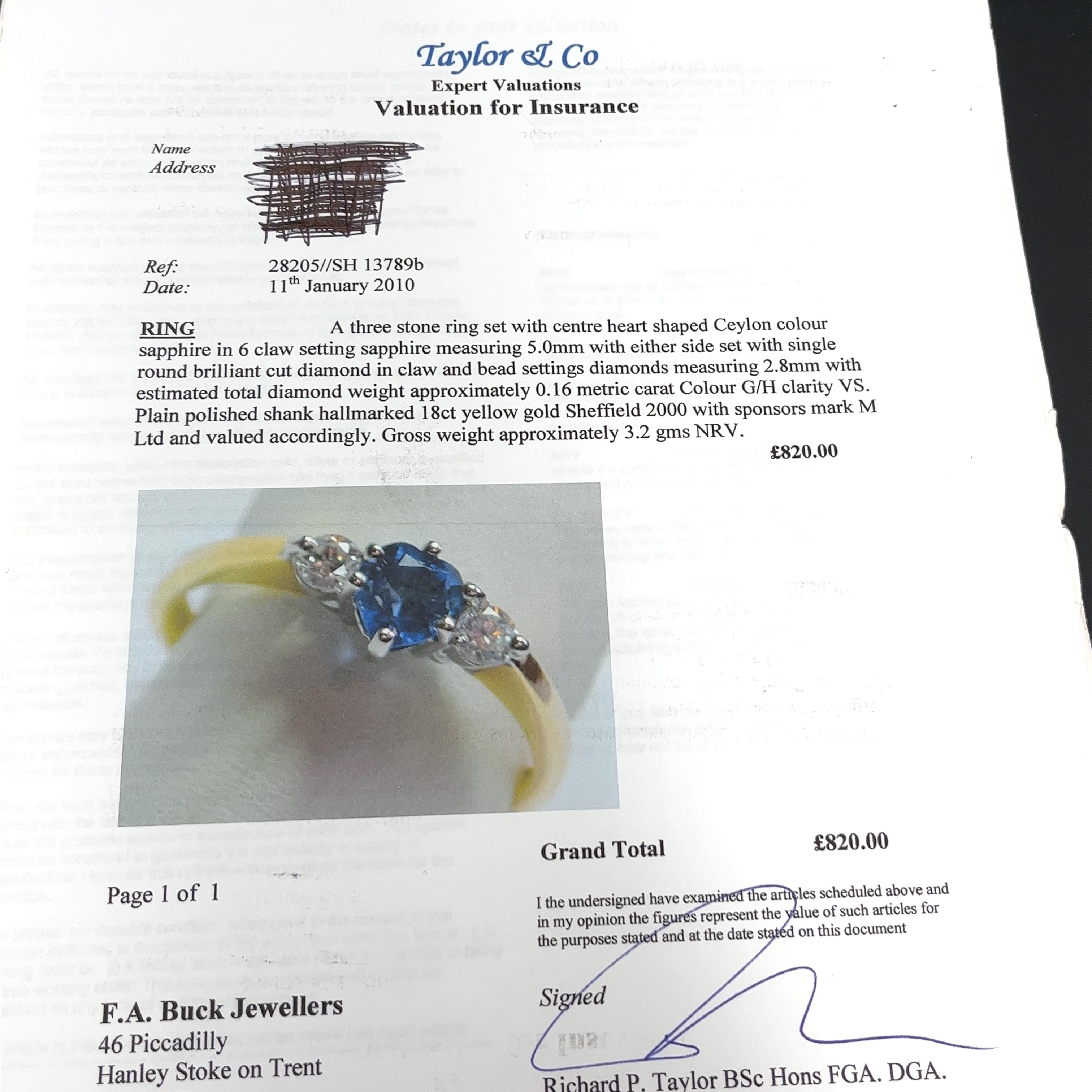 An elegant and unique vintage and diamond ring, 
set with 2 round brilliant cut natural diamonds 0.16ct,
and 1 heart shape Ceylon sapphire,
in an 18ct yellow and white gold beautiful setting.

Width of Band: 1.98mm
Width of Head: 5.98mm
Length of