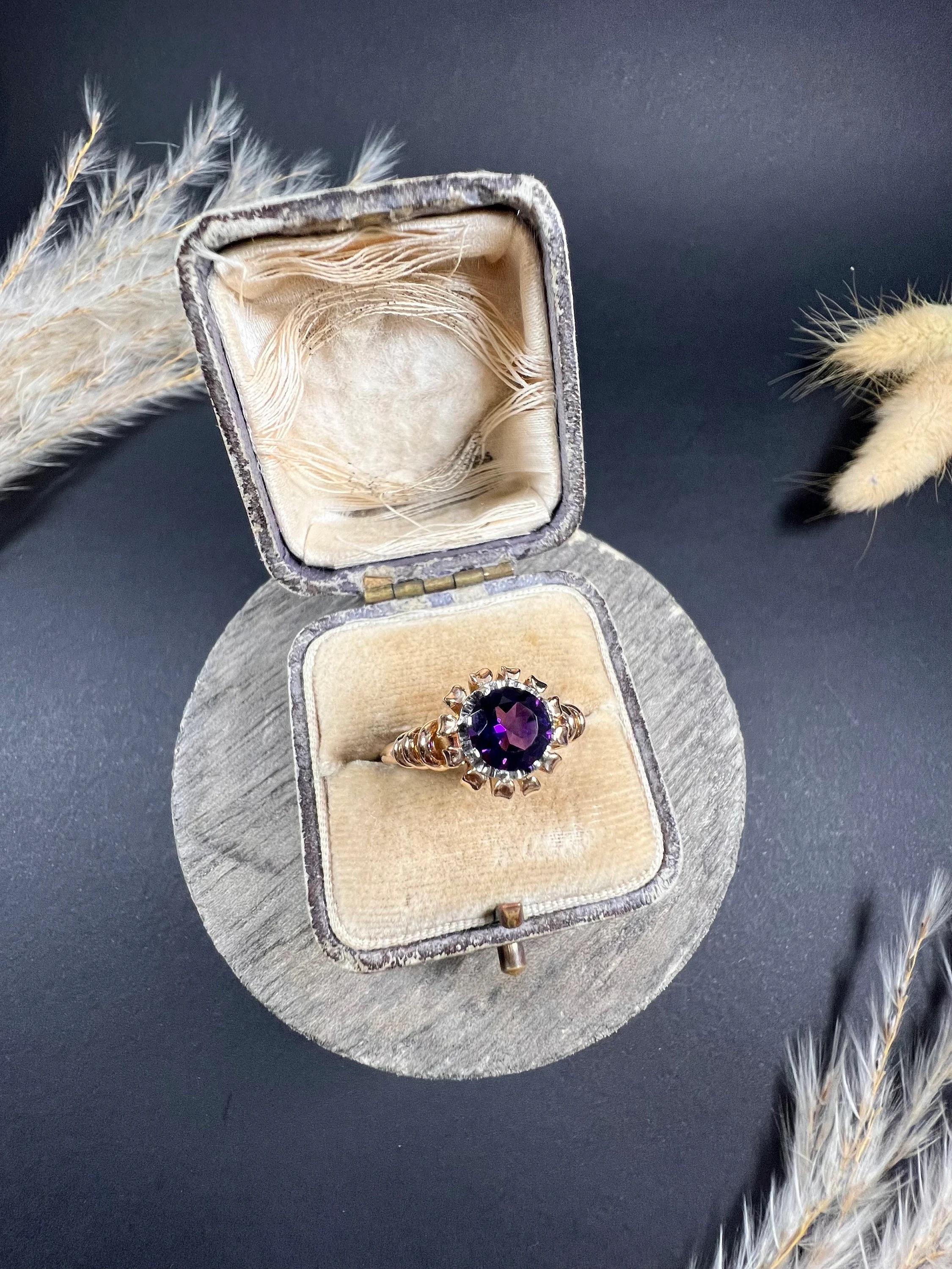 Vintage Diamond Ring

18ct Yellow & White Gold- French Stamped 

Circa 1940s

This stunning French vintage amethyst ring is a true beauty. The amethyst is perfectly showcased in its handmade, yellow gold setting, which provides a 360° view of the