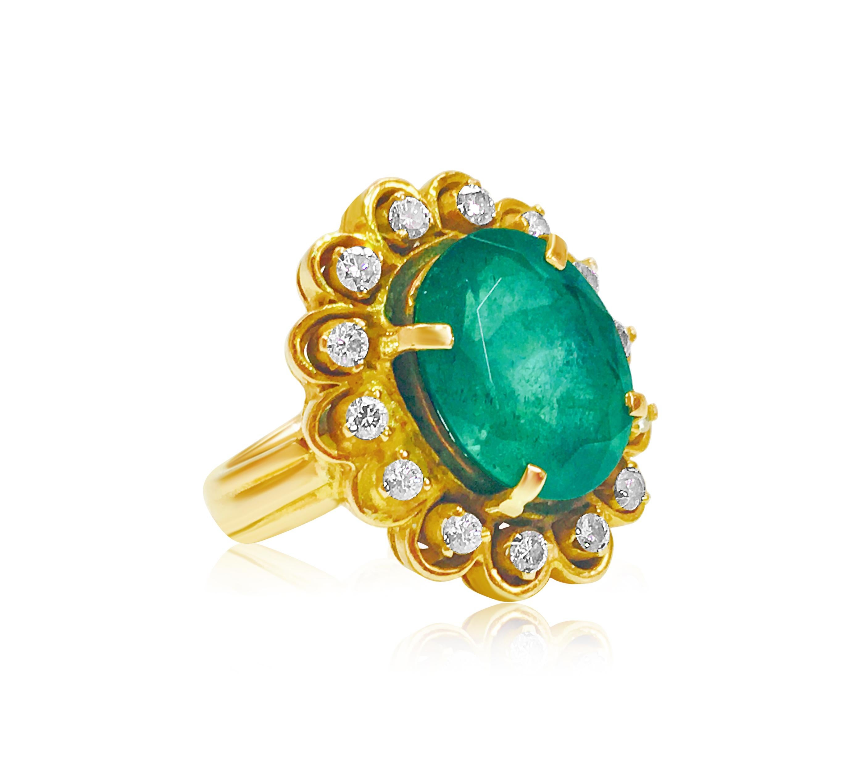 Indulge in luxurious elegance with this vintage ring, expertly crafted from 18K yellow gold. At its center gleams a magnificent 5.50-carat oval-cut natural emerald, held securely in place by delicate prongs. Encircling the emerald are dazzling