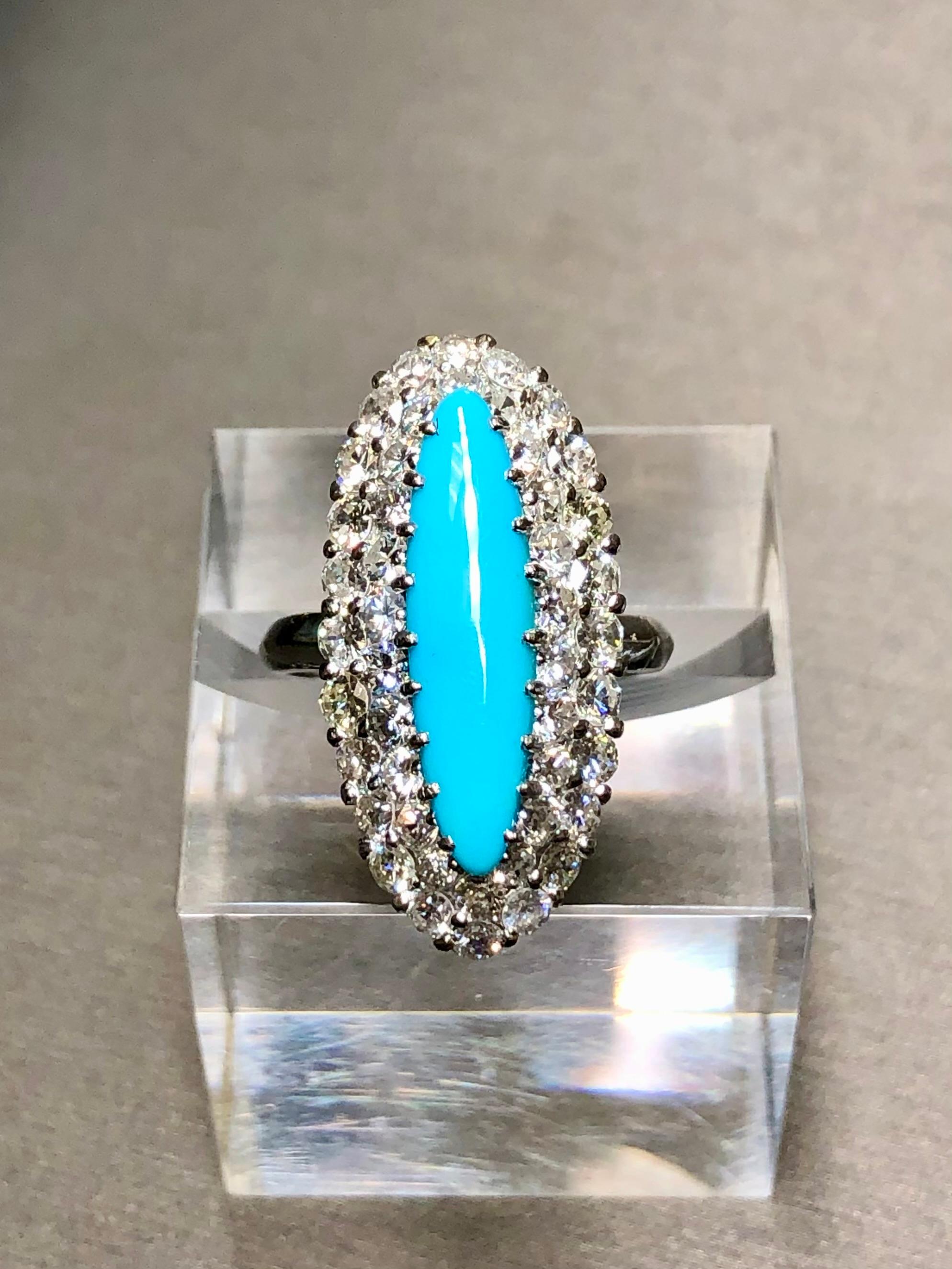 A spectacular ring c. the 1940’s crafted in 18K white gold centered by a marquise cut cabochon of Persian turquoise surrounded by approximately 2.78cttw in H-I color Vs2-Si2 clarity old European cut diamonds.


Dimensions/Weight:

Ring measures 1.1”