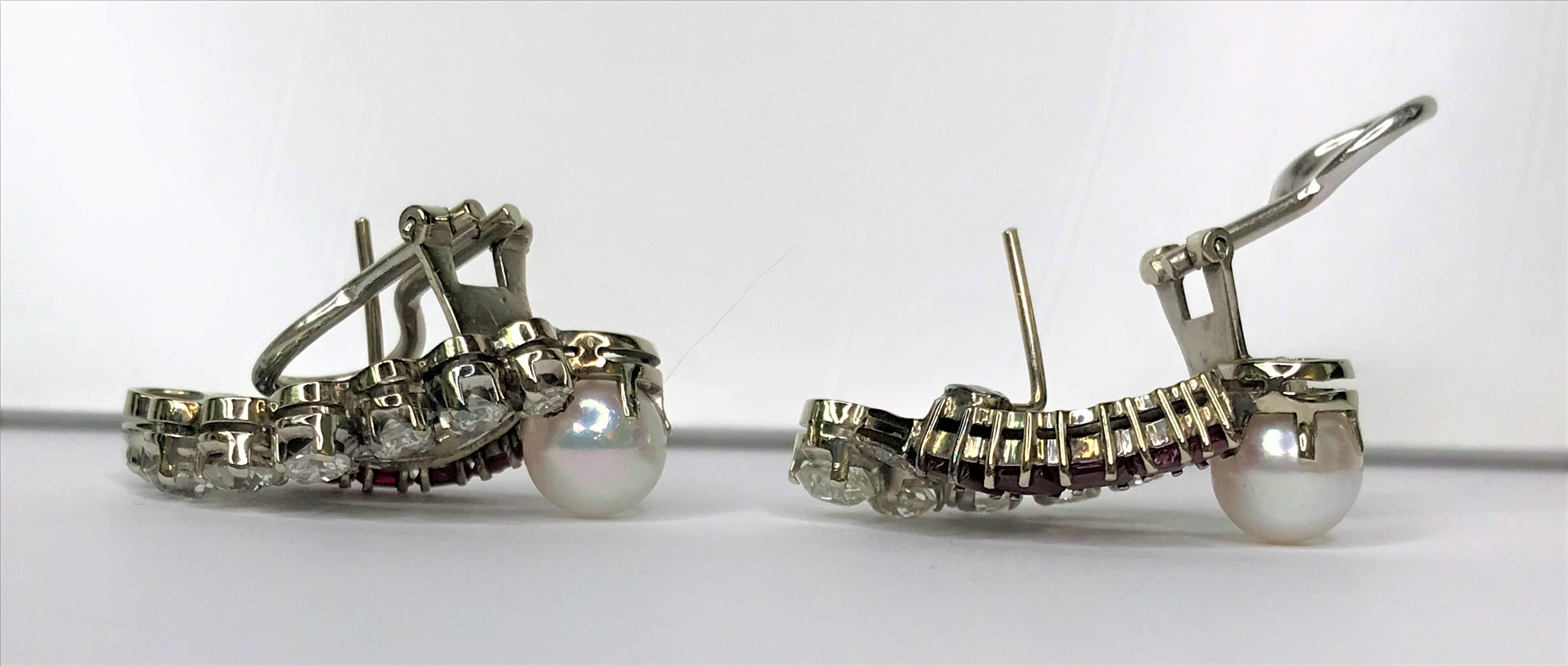 Diamonds!  Rubies!  Pearls!  What else can you ask for?  These gorgeous earrings are truly one-of-a-kind and will make any outfit special!
18 karat white gold elongated design with lots of sparkle.
Approximately 3.8 total diamond weight, mix of Old