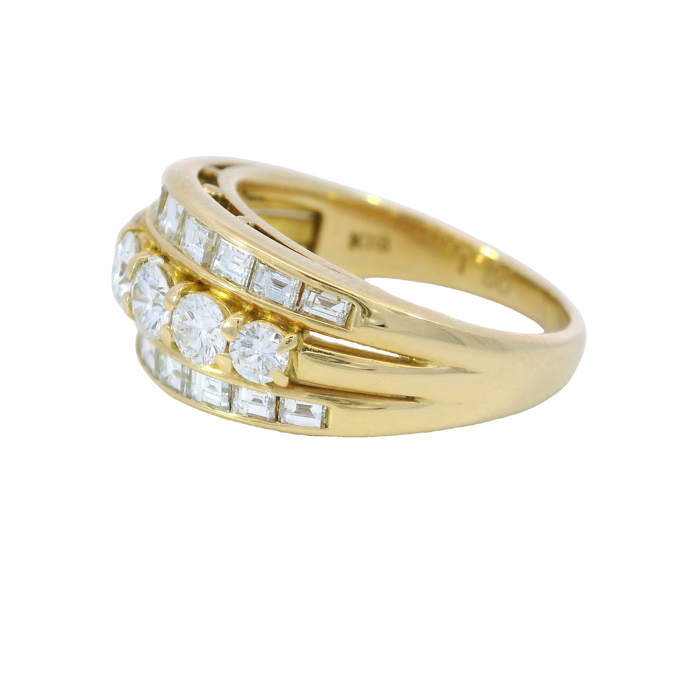 Vintage 18K Diamond Stacker Ring ~1.8ctw

Set in rich 18k yellow gold, this contemporary ring features approximately 1.8 carats of mixed-cut white diamonds arranged in a layered, architectural design. A central row of round diamonds is framed by