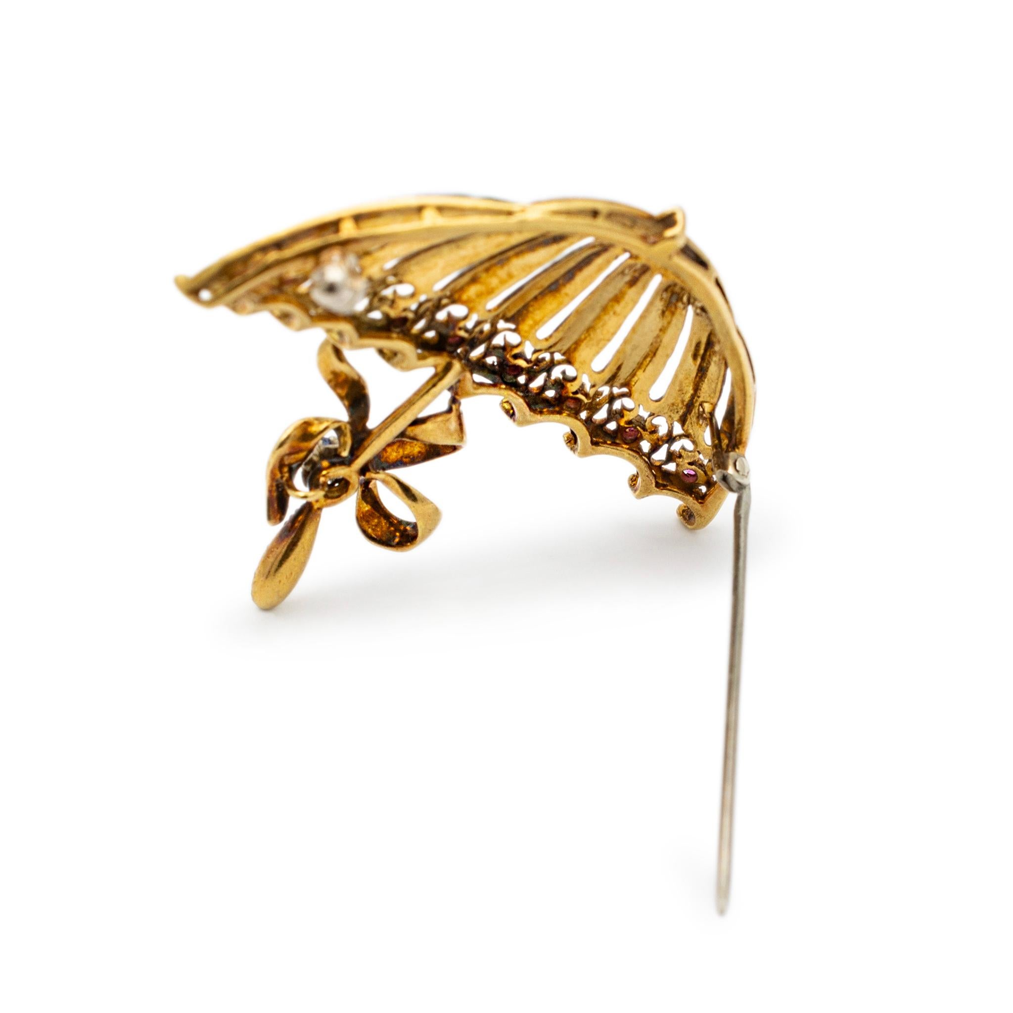 Metal Type: 18K Yellow Gold

Length: 1.75 Inches

Width: 2.00 Inches

Weight: 11.85 grams

Handmade 18K yellow gold sapphire and ruby pin. Back Pin is base metal. Engraved with 