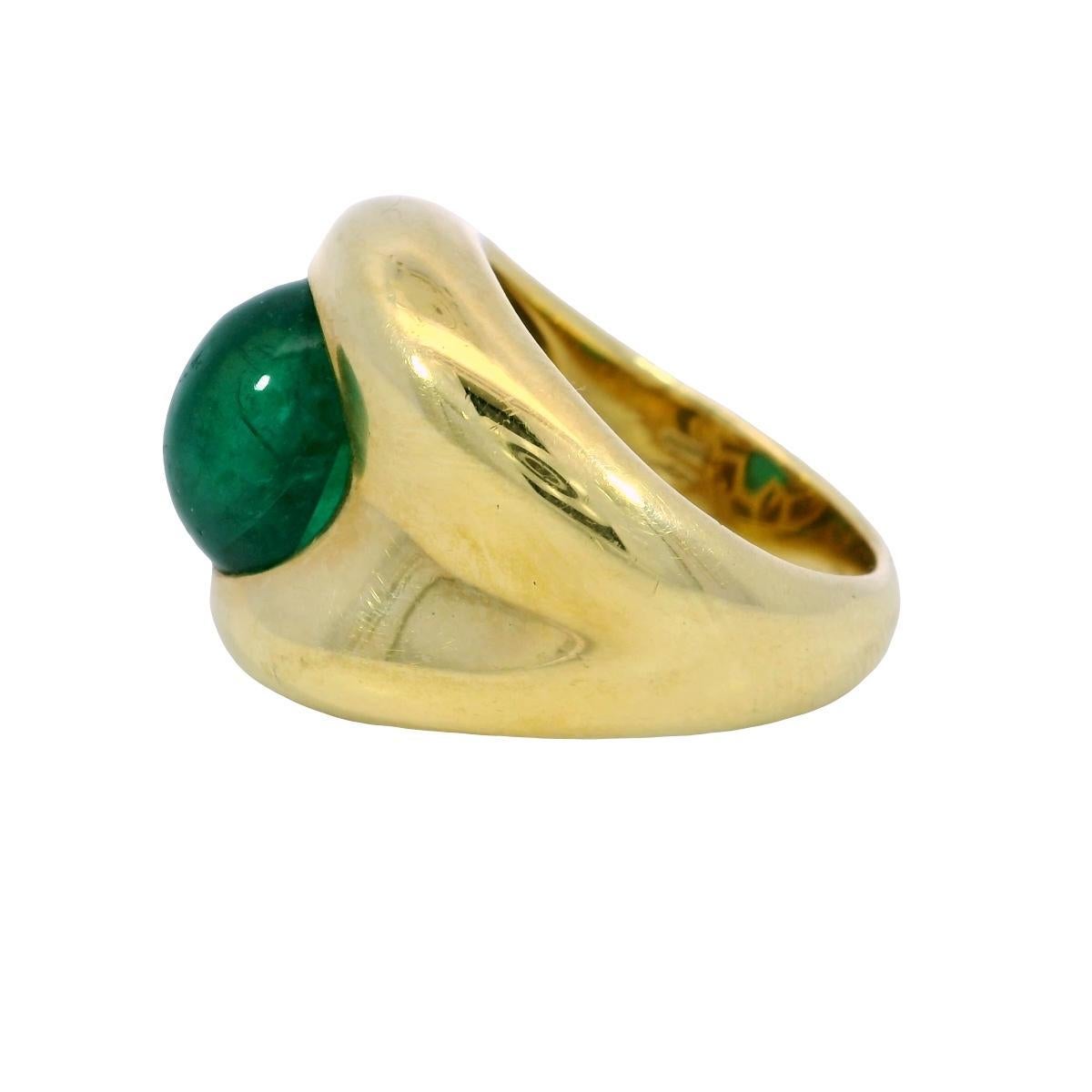 Vintage 18K Emerald Ring Yellow Gold Cabochon Cut ~5.84ct Size 7.25

This bold ring centers on a cabochon-cut emerald weighing approximately 5.84 carats, its rich green hue offering depth and vivid color. The smooth, domed surface of the stone