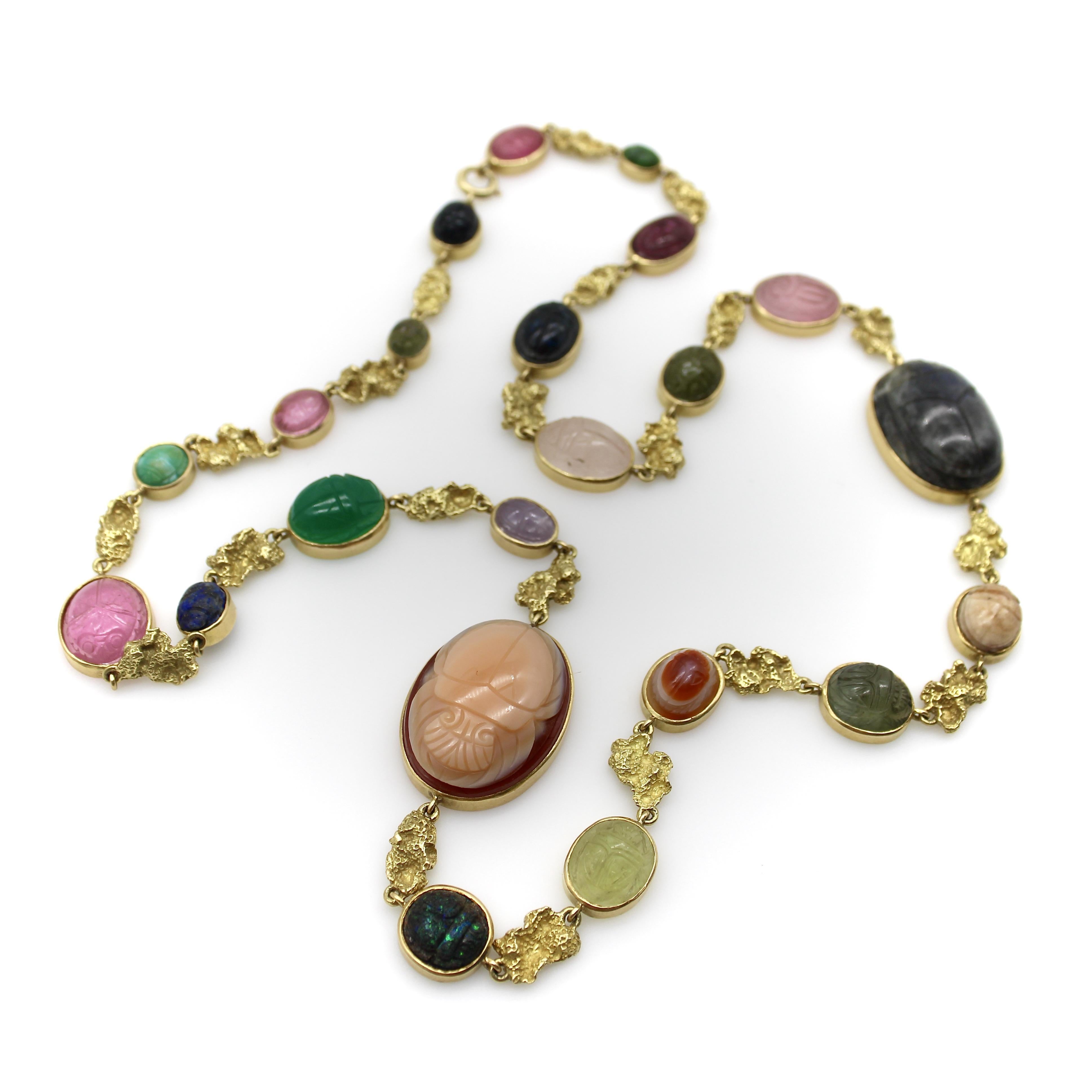 In a beautiful array of colors, shapes, and sizes, this fabulous French necklace combines some of Kirsten’s Corner’s favorite things: Egyptian Revival and nuggets. In between each scarab cabochon is a cast 18k gold nugget, with texture and shape