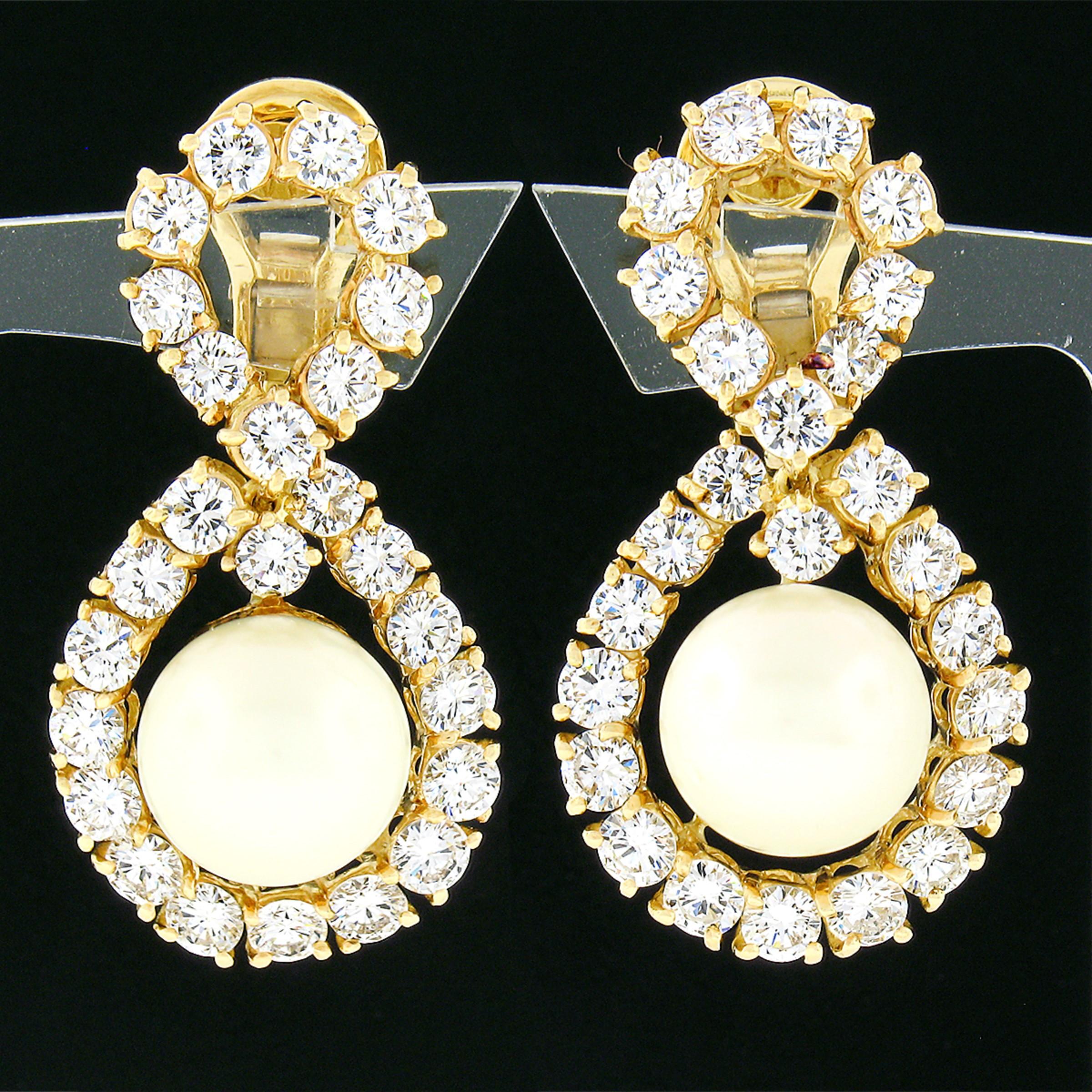 Here we have an incredibly designed pair of vintage earrings that were crafted from solid 18 yellow gold. They feature an elegant drop dangle style with a figure 8 or infinity design that is neatly set with very fine diamonds throughout with a