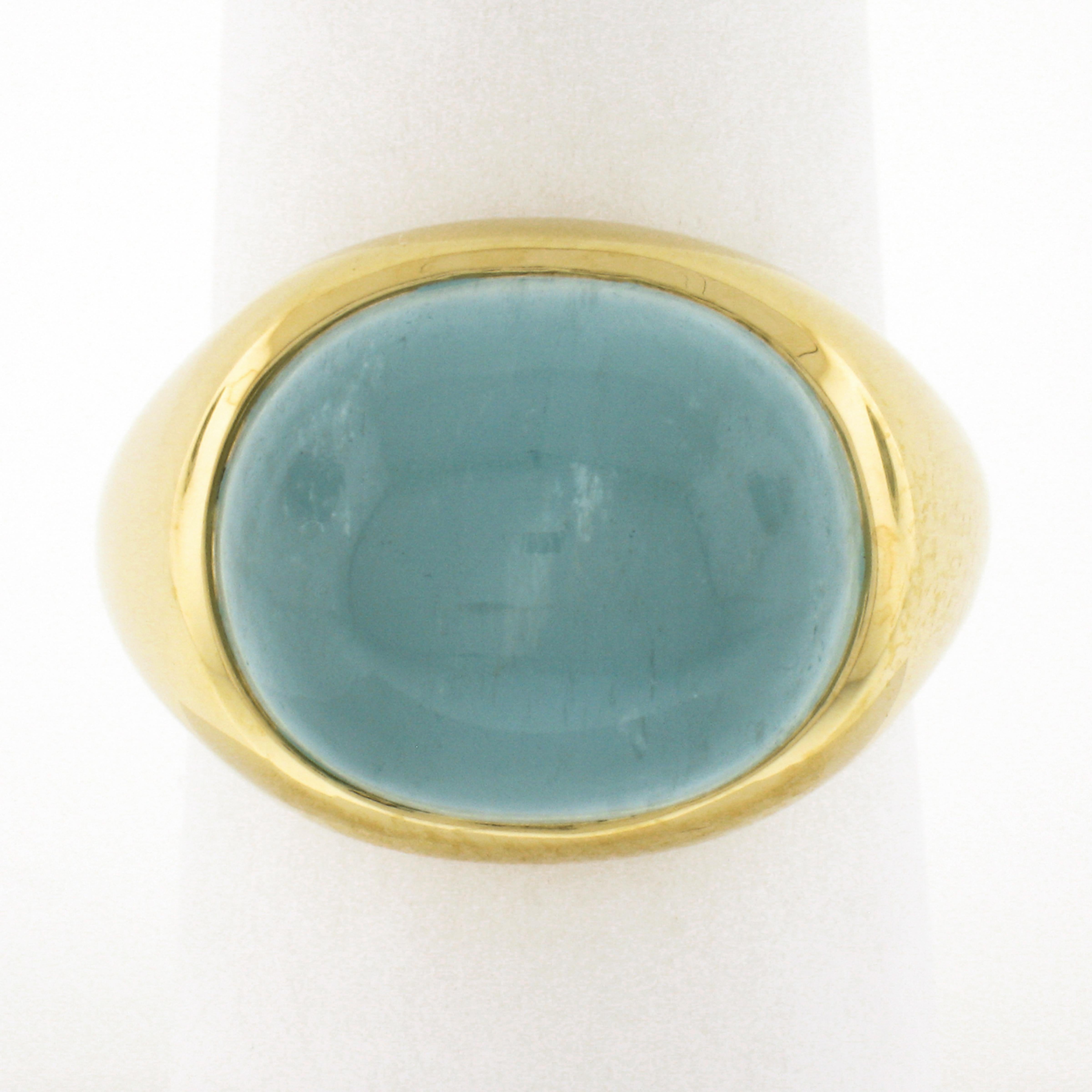 Hier haben wir eine wirklich kühne Vintage-Cocktail-Ring, der sehr gut in Handarbeit in massivem 18k Gelbgold und verfügt über eine sehr seltene, GIA zertifiziert, oval Cabochon geschnitten Katzenauge Aquamarin ordentlich Lünette in der Mitte