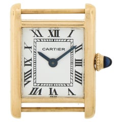 Cartier Montre Tank & Audemars Piguet vintage en or 18 carats avec boucle déployante de 20 mm