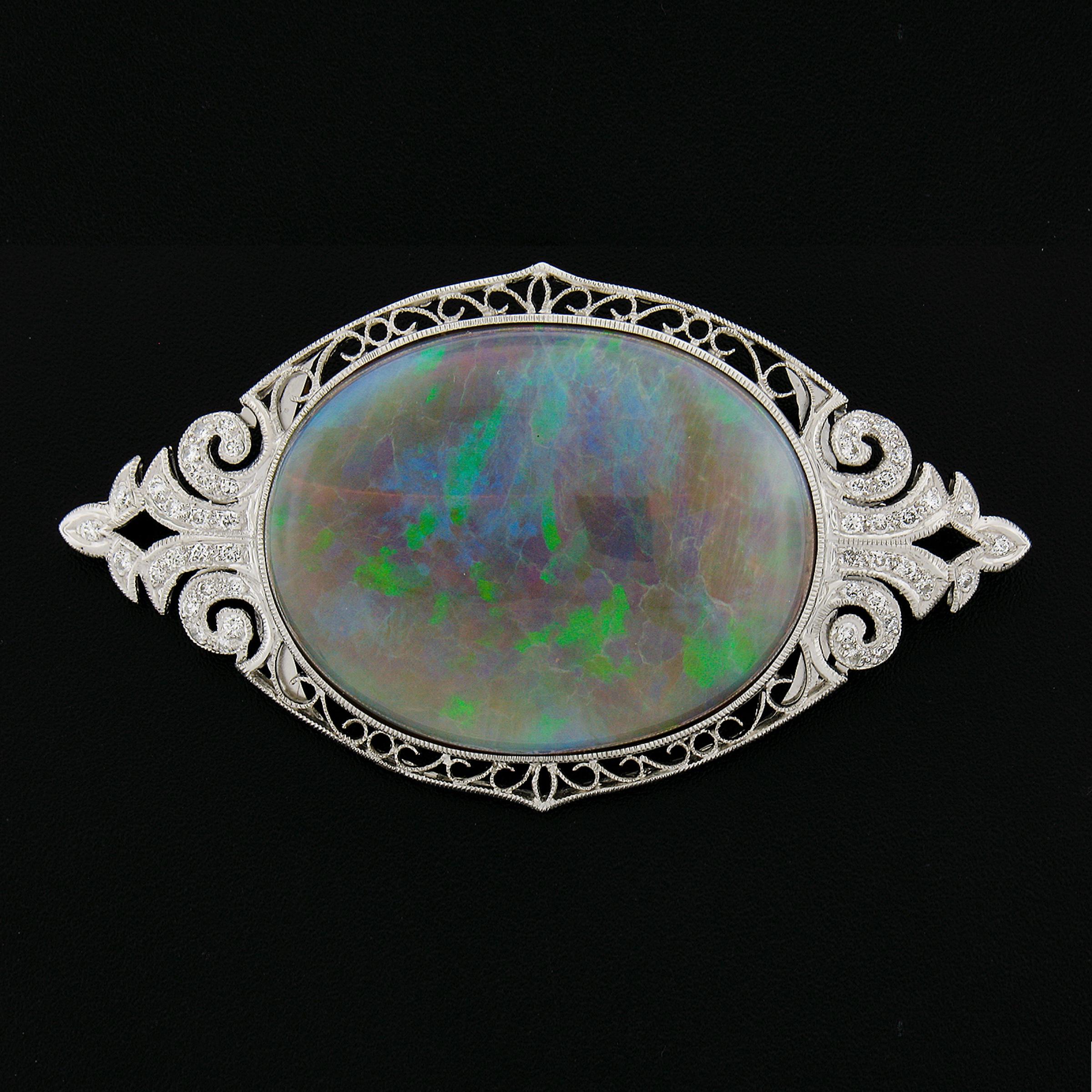 --Stone(s):--
(1) Natural Genuine Opal - Oval Cabochon Cut - Bezel Set - Gray Color w/ Play of Green, Blue, Orange, Purple  & Red (depending on light) - 61ct (approx. based on measurement. )
**See Certification Details Below For More Info**
(46)