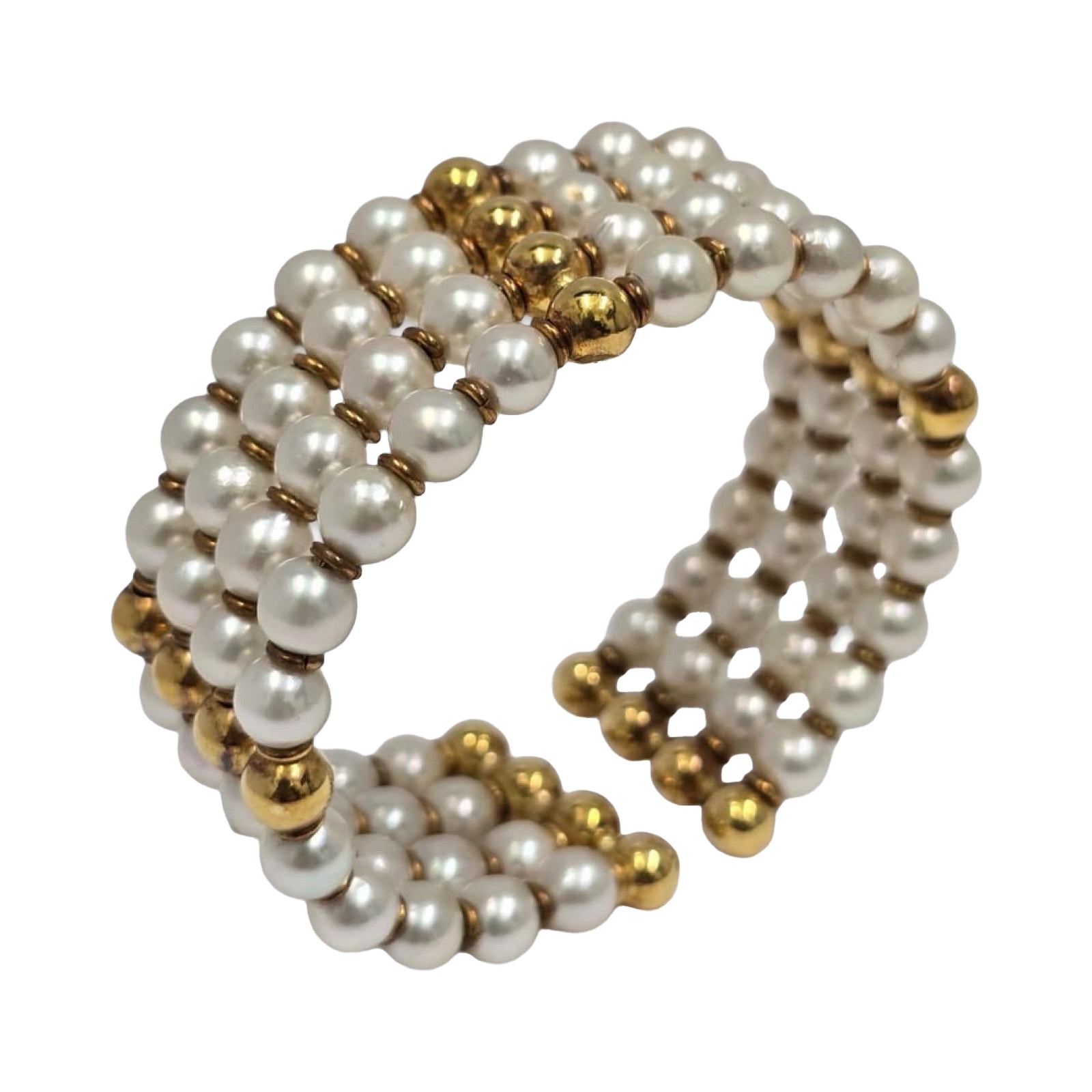Bracciale strutturale d
epoca in oro 18 carati e perle coltivate da 6,5 mm a cinque file in vendita