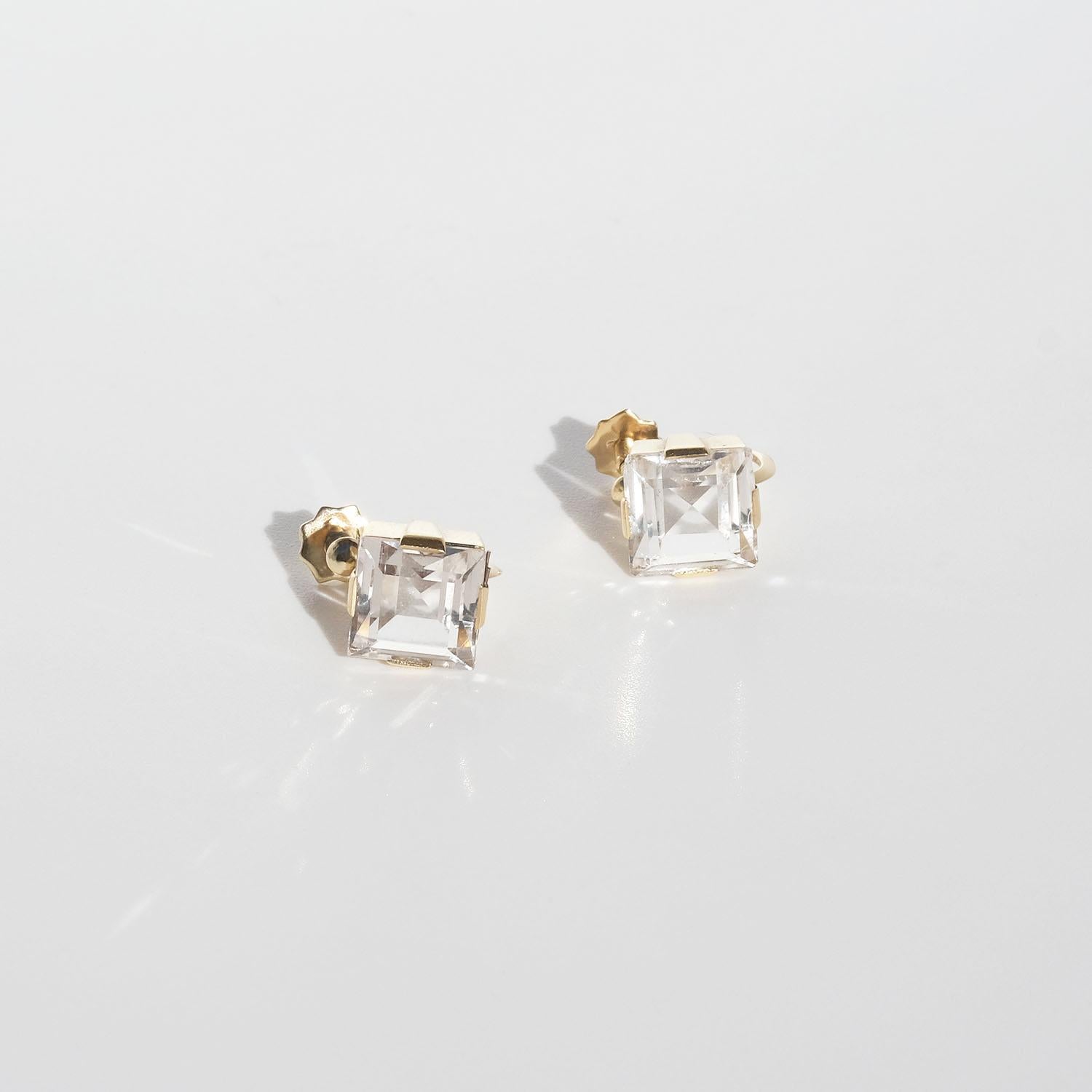 These 18k gold, carré cut rock crystal earrings have a feminine and classic shape. The earrings have so-called screw backs, like many of the earrings during the early 1900s through the 1950s had.

The best way to describe what these earrings convey