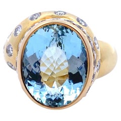 Bague vintage en or 18 carats aigue-marine et diamants