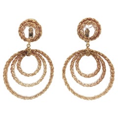 Orecchini circolari a pendente intrecciati in oro 18 ct.