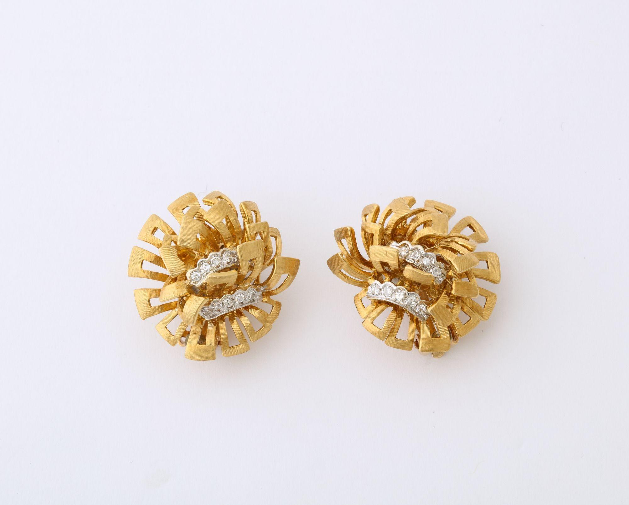 Vintage 18K yellow and white gold diamond cluster floral motif clip earrings, set with approx: 1.90 cttw. Old Miners and Old European-cut diamonds; color: H-I, clarity: SI1 - SI2. Marked: 