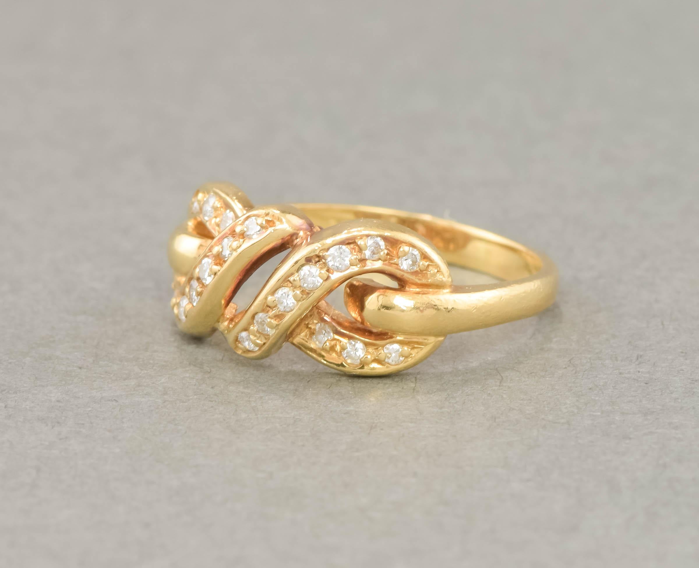 Contemporary Vintage 18K Gold Diamond Infinity Love Knot Ring, Hallmarked 1985 For Sale