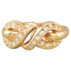 Bague vintage en or 18 carats avec nœud d'amour infini et diamants, poinçonnée 1985