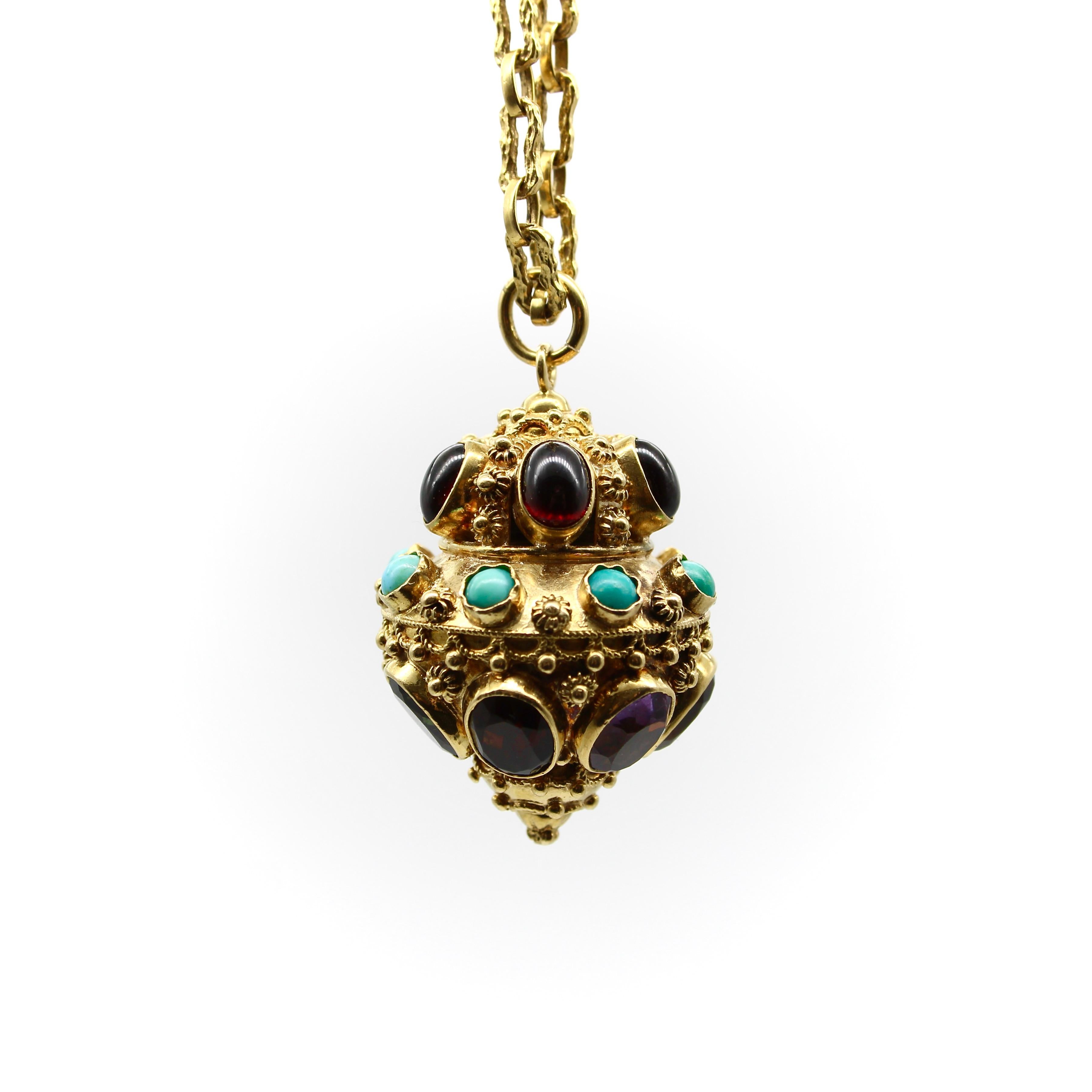 This vintage 18k gold Italian lantern charm is encrusted with citrine, amethyst, garnet, tourmaline and turquoise, bezel set among Etruscan Revival wirework and granulation. The ornate vintage piece was most likely first purchased at the Ponte