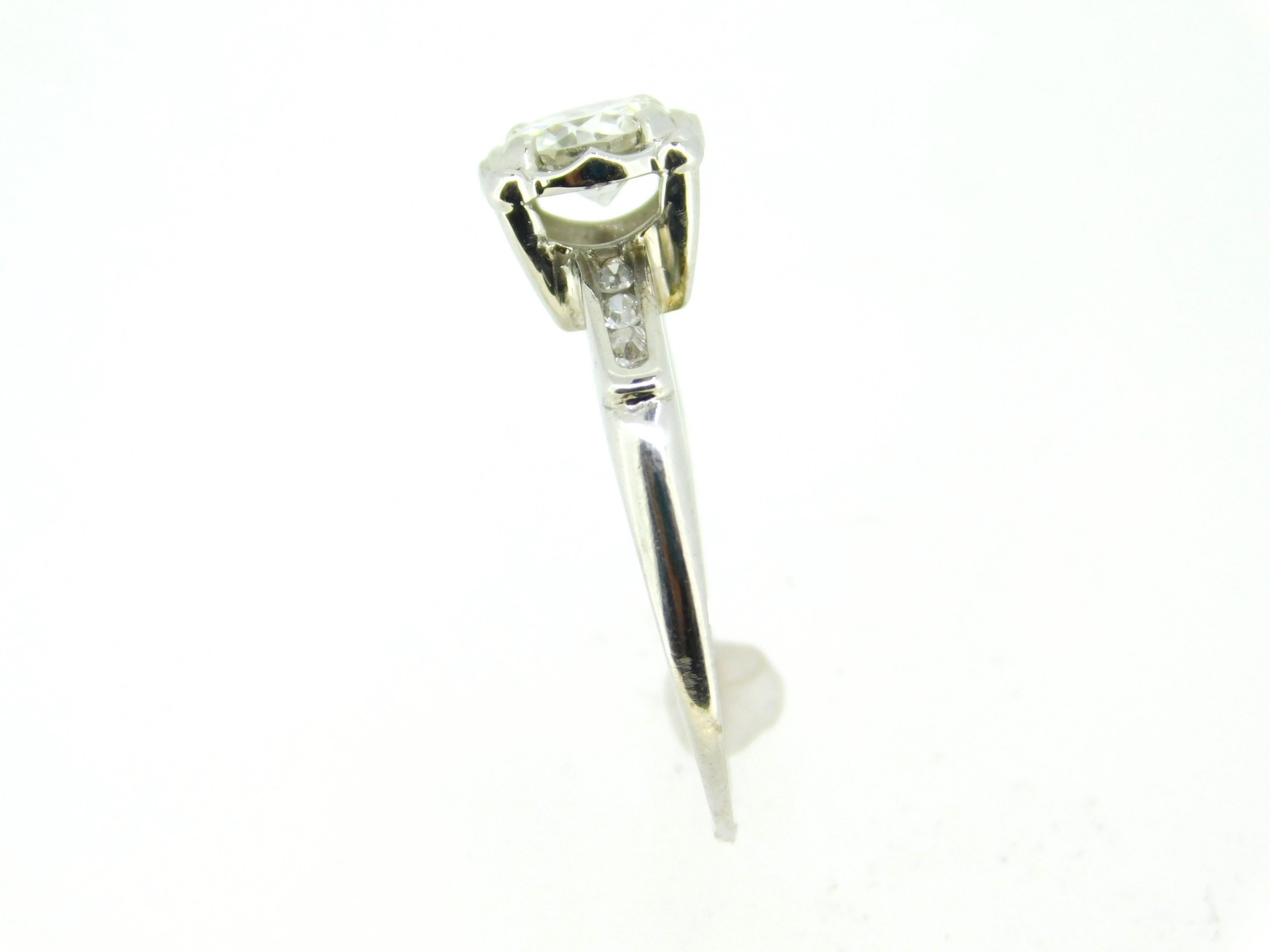 Vintage 18k Gold Genuine Natural Diamond Engagement Ring 3/4ct Total (#J4495)
18k white gold diamond engagement ring featuring a round brilliant cut diamond weighing .65cts. The diamond measures about 5.5mm and has I-1 clarity and H-I color. There