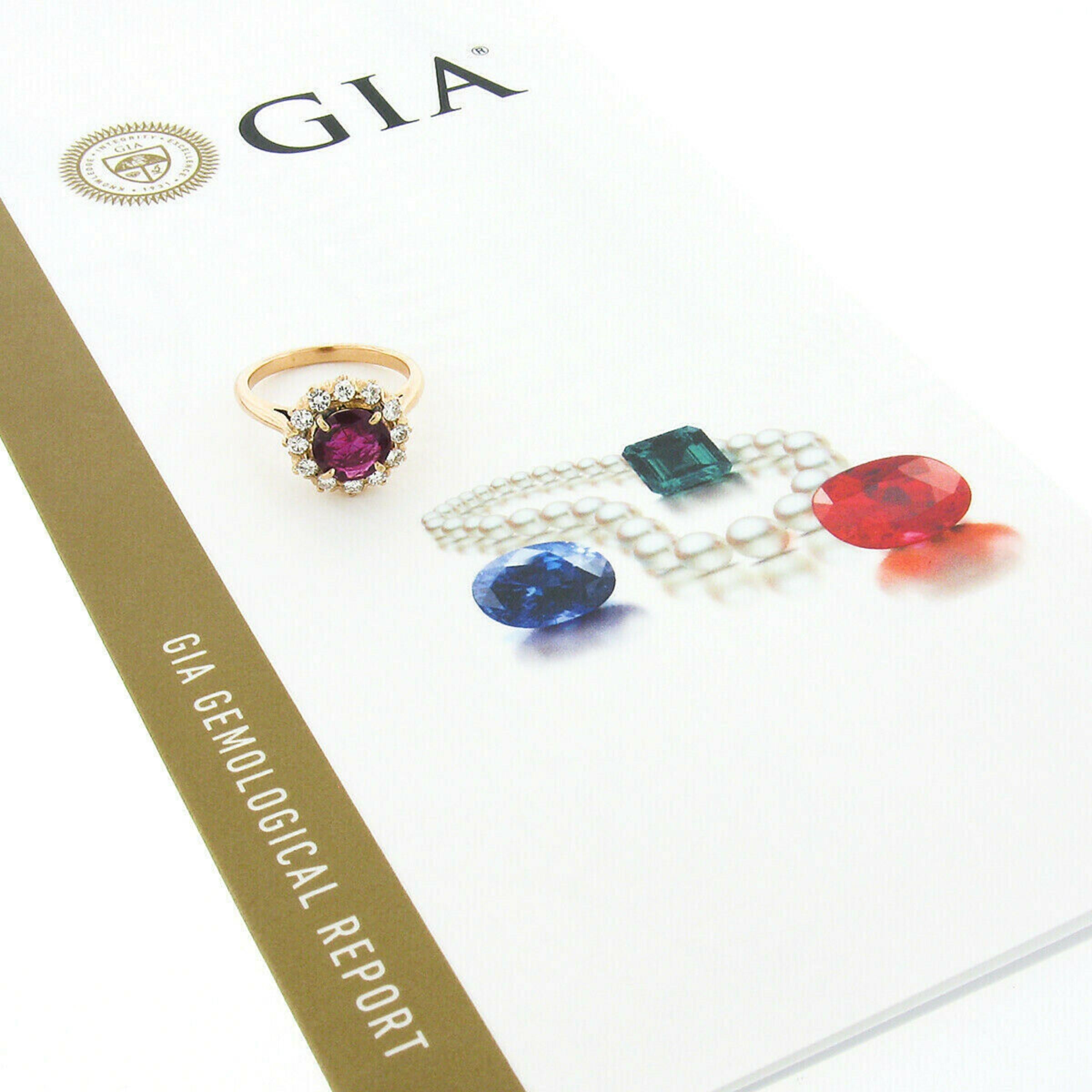 Bague vintage en or 18 carats avec halo de diamants et rubis de Birmanie rond de 1,50 carat, certifié GIA, sans chaleur en vente 5
