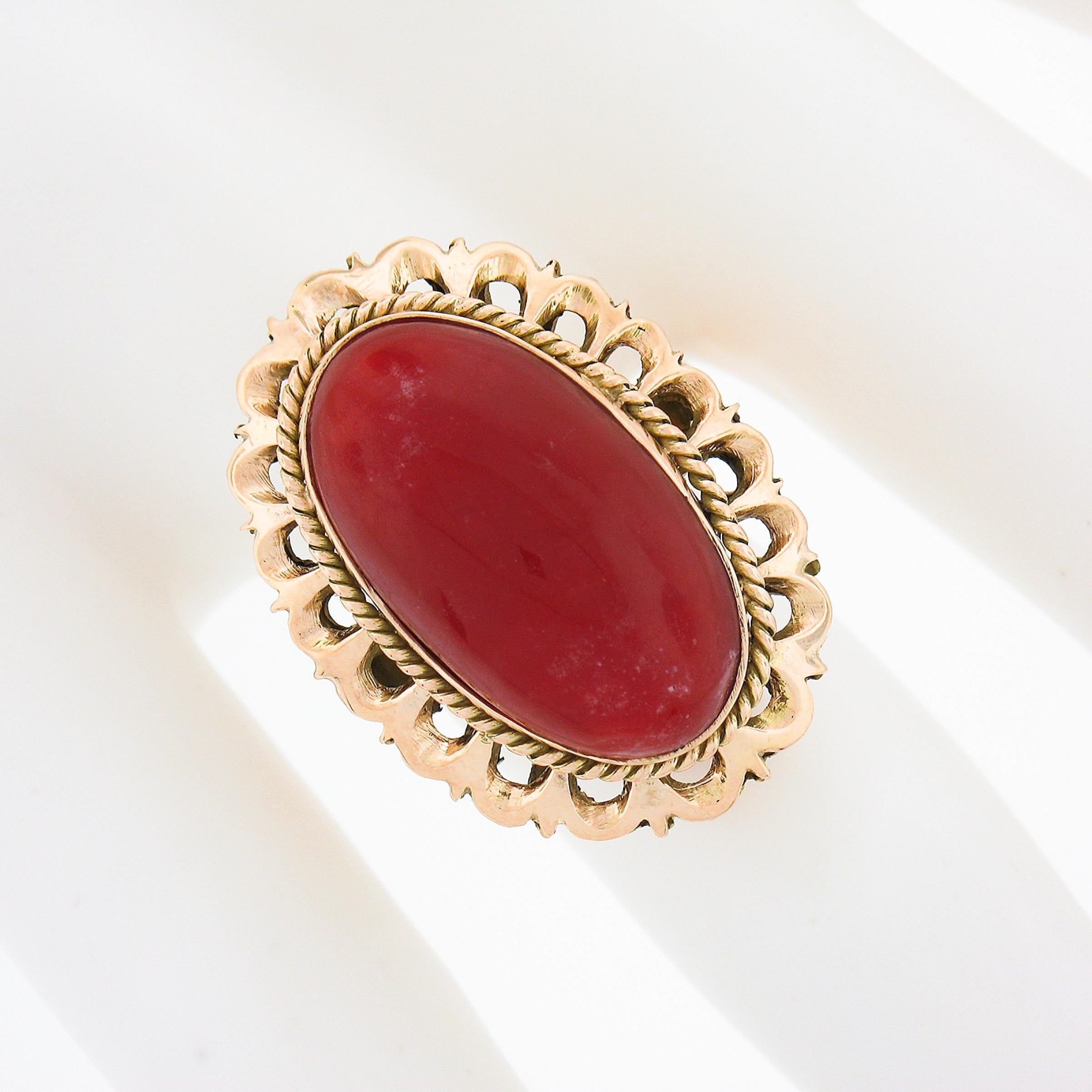 Oval Cut Vintage 18k Gold GIA Oval Cabochon Orangy-Red Coral w/ Open Work Frame Ring For Sale