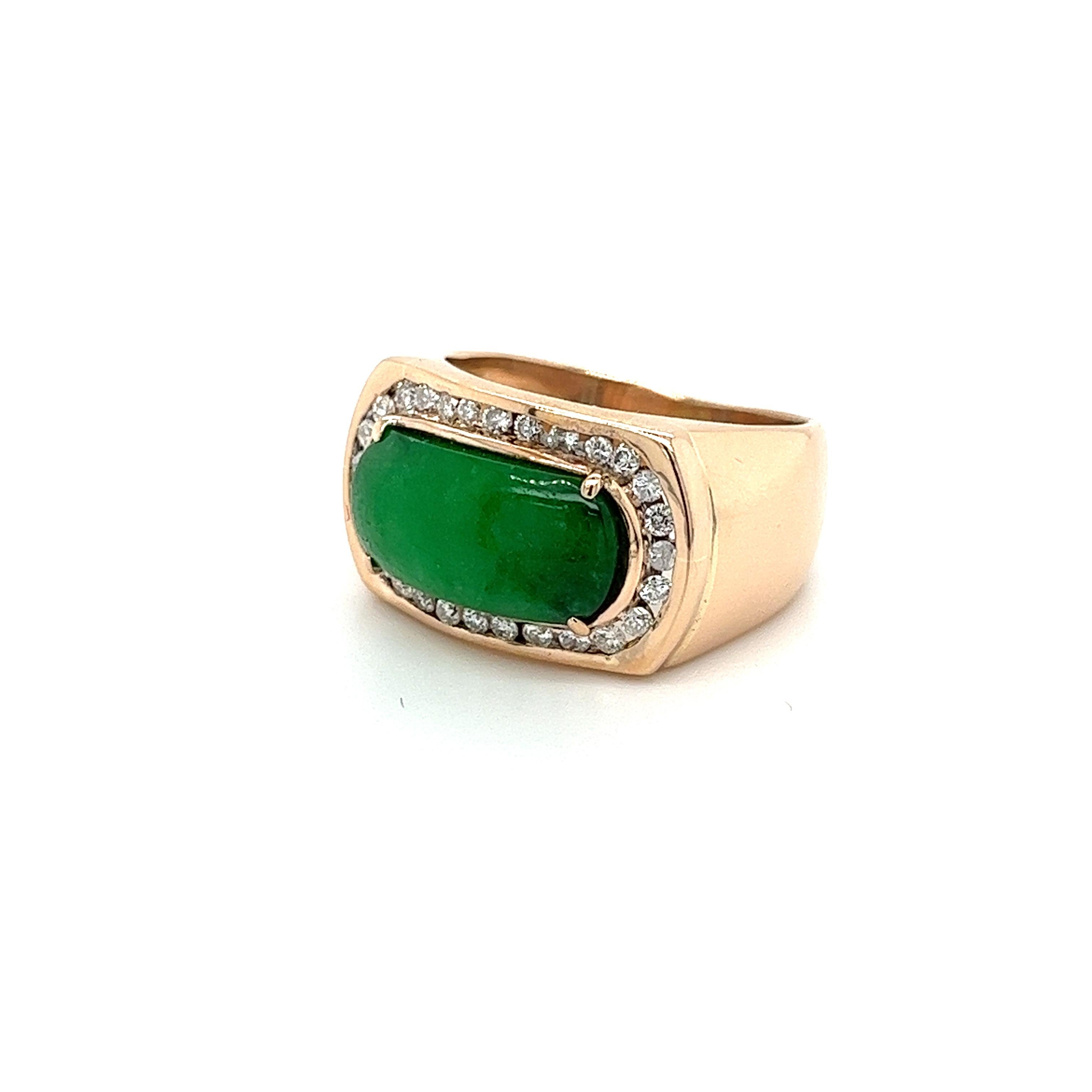 This exquisite 18K rose gold jadeite jade and diamond halo ring boasts a stunning horizontal cabochon jade center stone and is adorned with 28 channel set round cut diamonds totaling 0.50ctw. The ring face measures 20 x 12.7mm and the entire piece