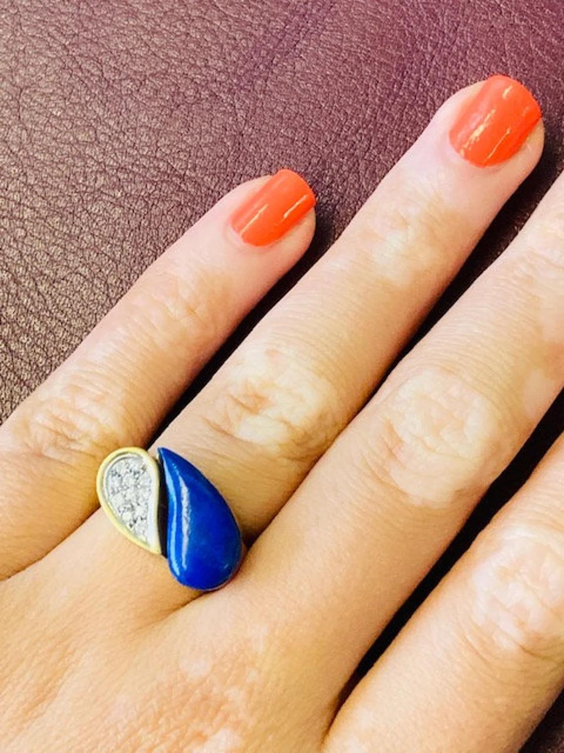 Vintage 18k Gold Lapis Lazuli and Diamond Teardrop Ring, One-of-a-kind

This eye-catching piece from the 1980s is the ideal ring for everyday wear, or for a special occasion. The lapis lazuli is guaranteed to add a beautiful splash of colour to