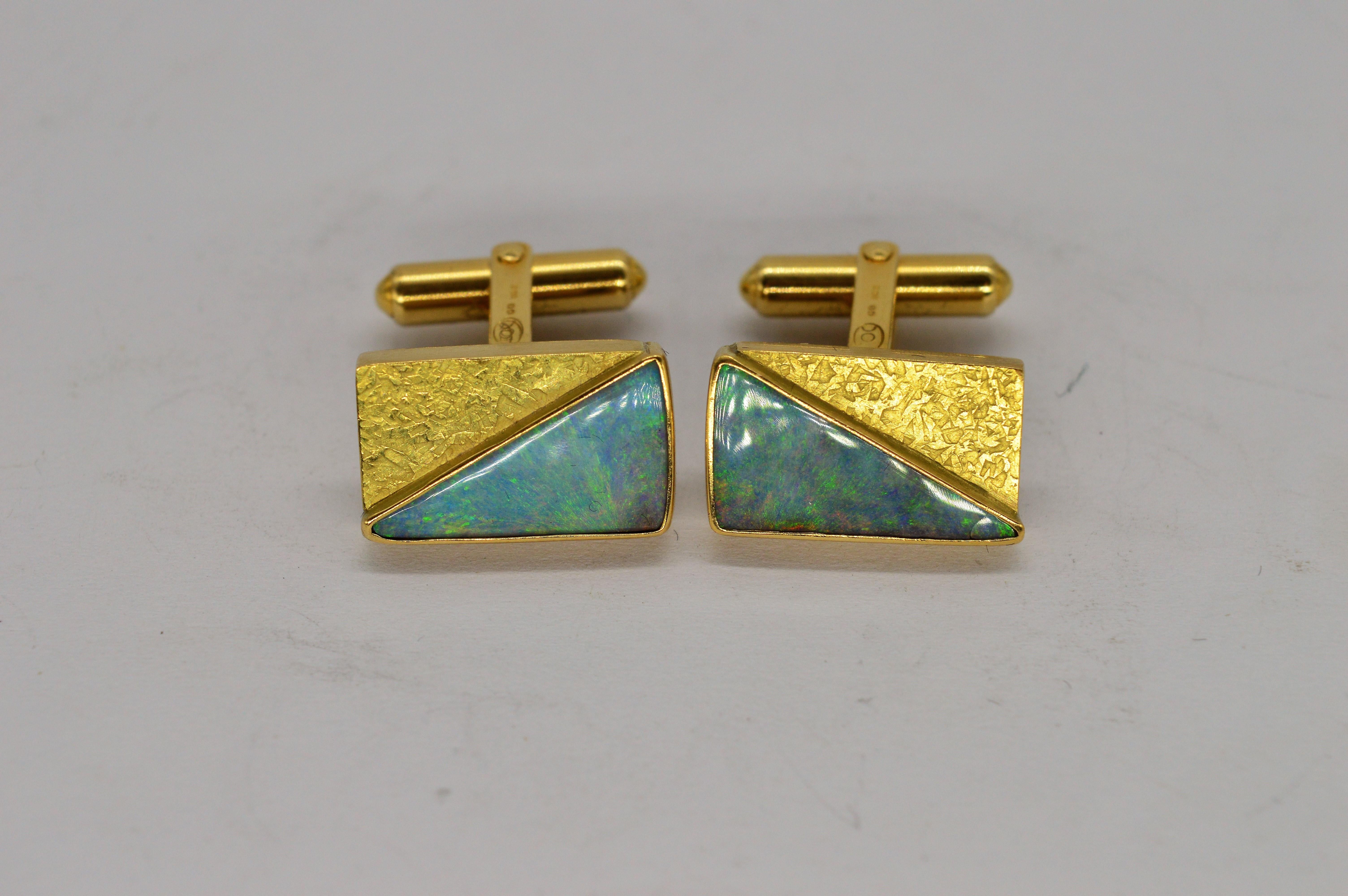 A set of hand crafted 18ct gold Black Opal doublet cufflinks 

Reminiscent of the brutalist styling, these hand crafted cufflinks feature perfectly matched black opal triplets of incredible quality

11.79g

We have sold to the set of Hit shows like
