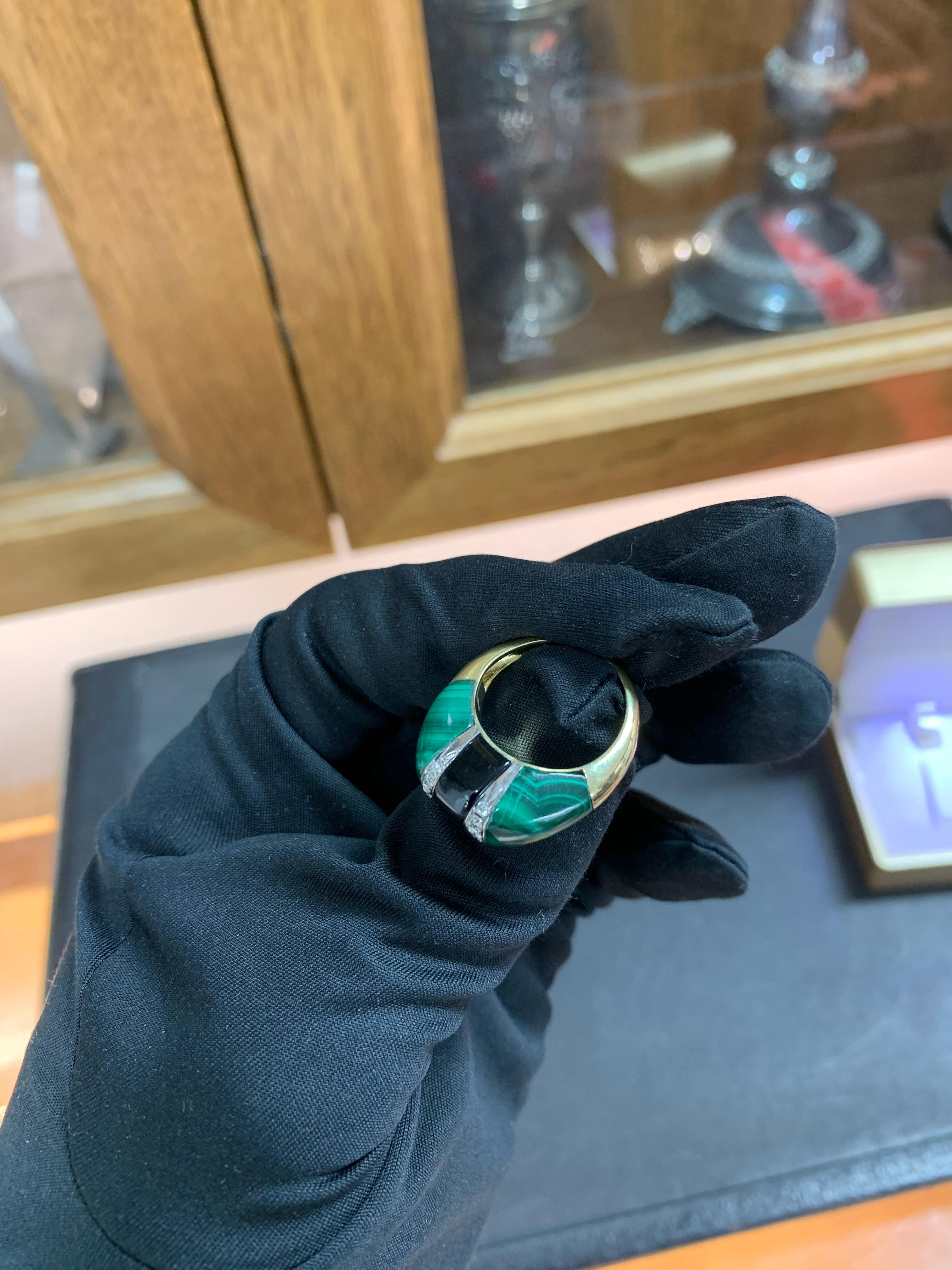 Beautifully Hand Crafted 18k Yellow Gold Cocktail /Statement Ring Set With Green Malachite, Black Onyx & Diamonds.
Amazing Shine, Incredible Craftsmanship.
Nice & Clean Stones.
Very Well Crafted.
Great Statement Piece.
