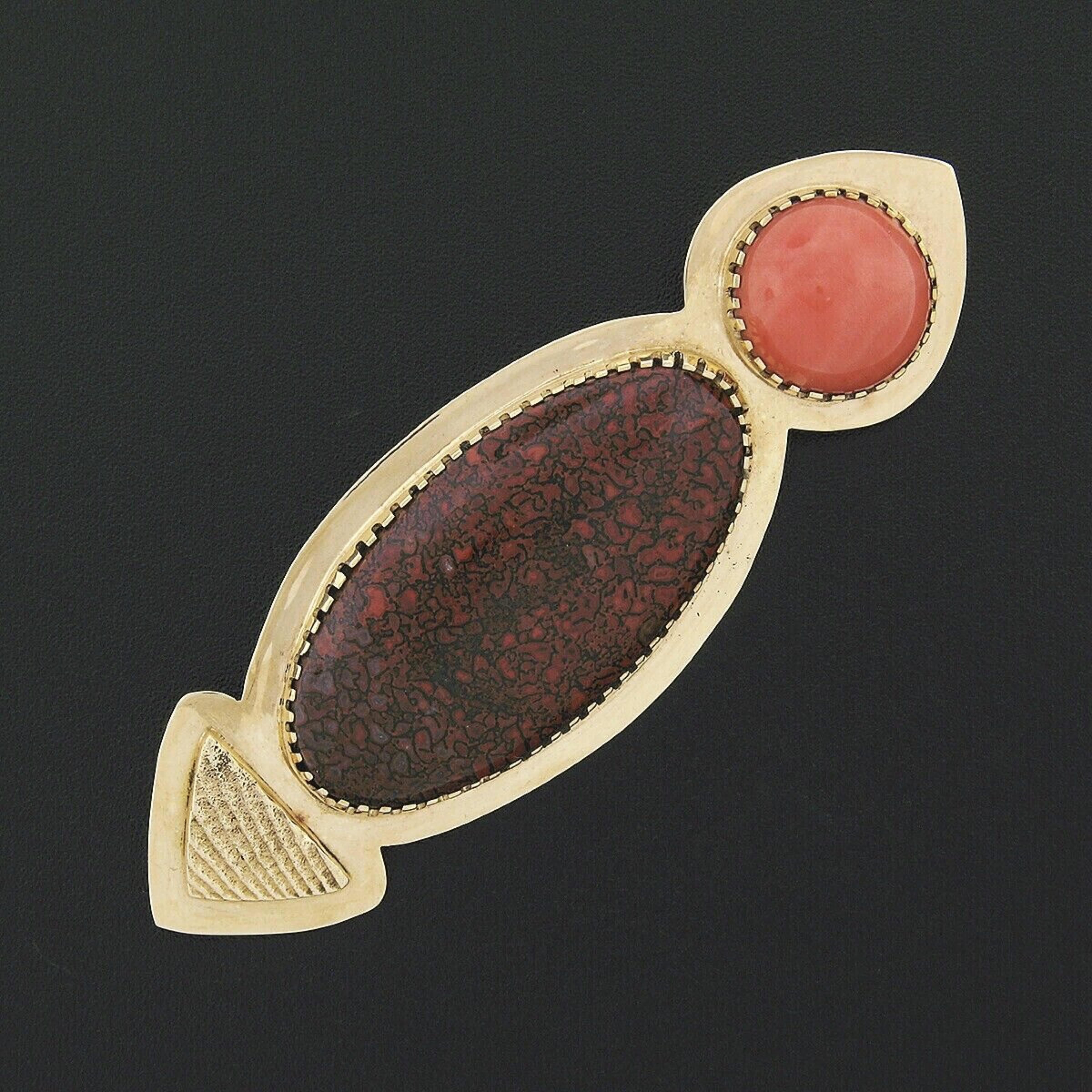 You are looking at a simply marvelous vintage pin brooch crafted from solid 18k yellow gold and features an elegant design of a multi-prong set oval agate at the center with a round coral at its side. The unique agate shows an attractive red and