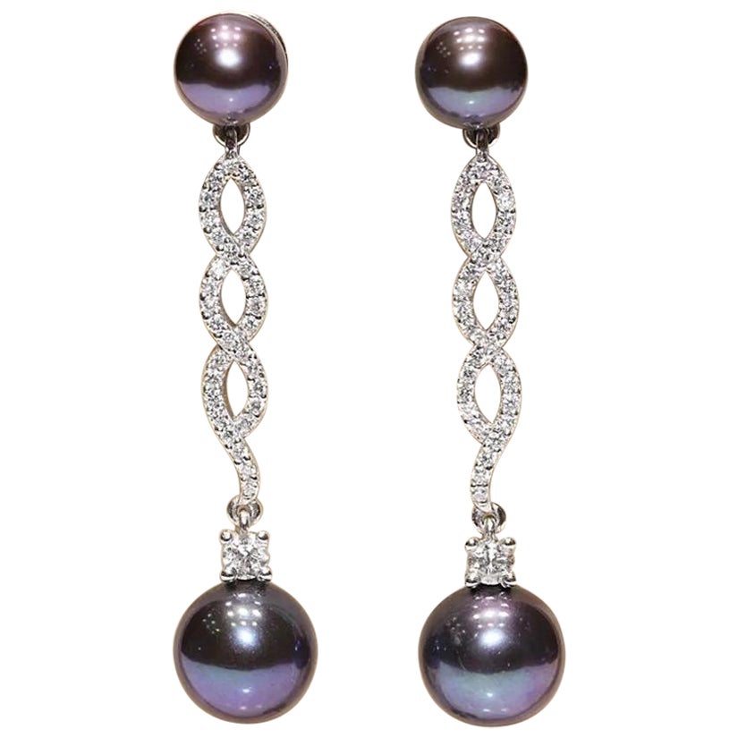 Orecchino a goccia decorato con diamanti naturali e perle in oro 18k vintage