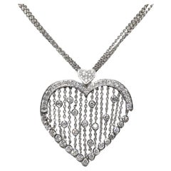 Collier vintage en or 18k avec pendentif en forme de coeur orné de diamants naturels 