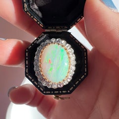 Vintage 18K gold opal diamond halo cocktail ring