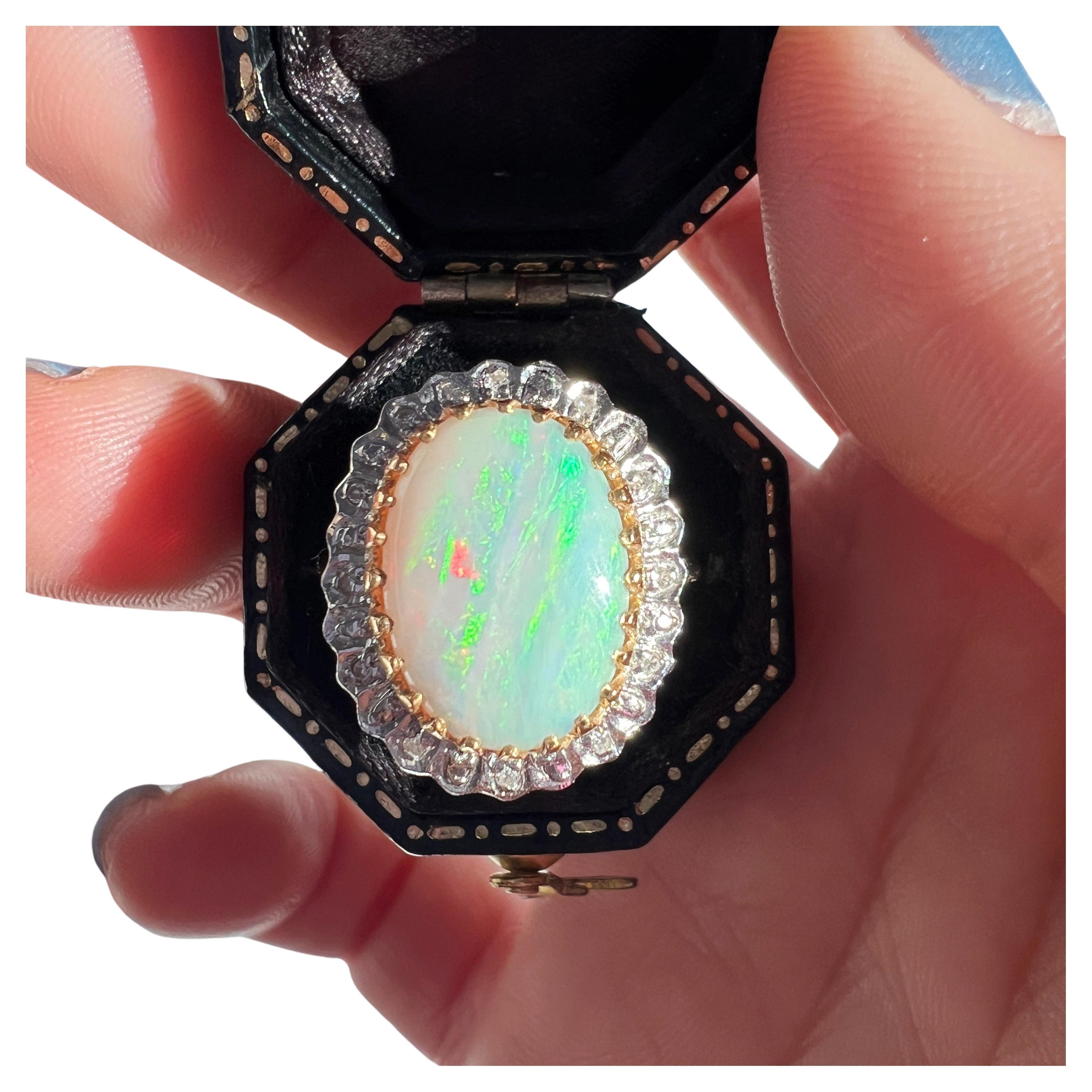 Vintage 18K gold opal diamond halo cocktail ring