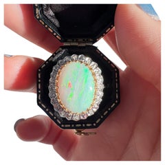 Antique 18K gold opal diamond halo cocktail ring