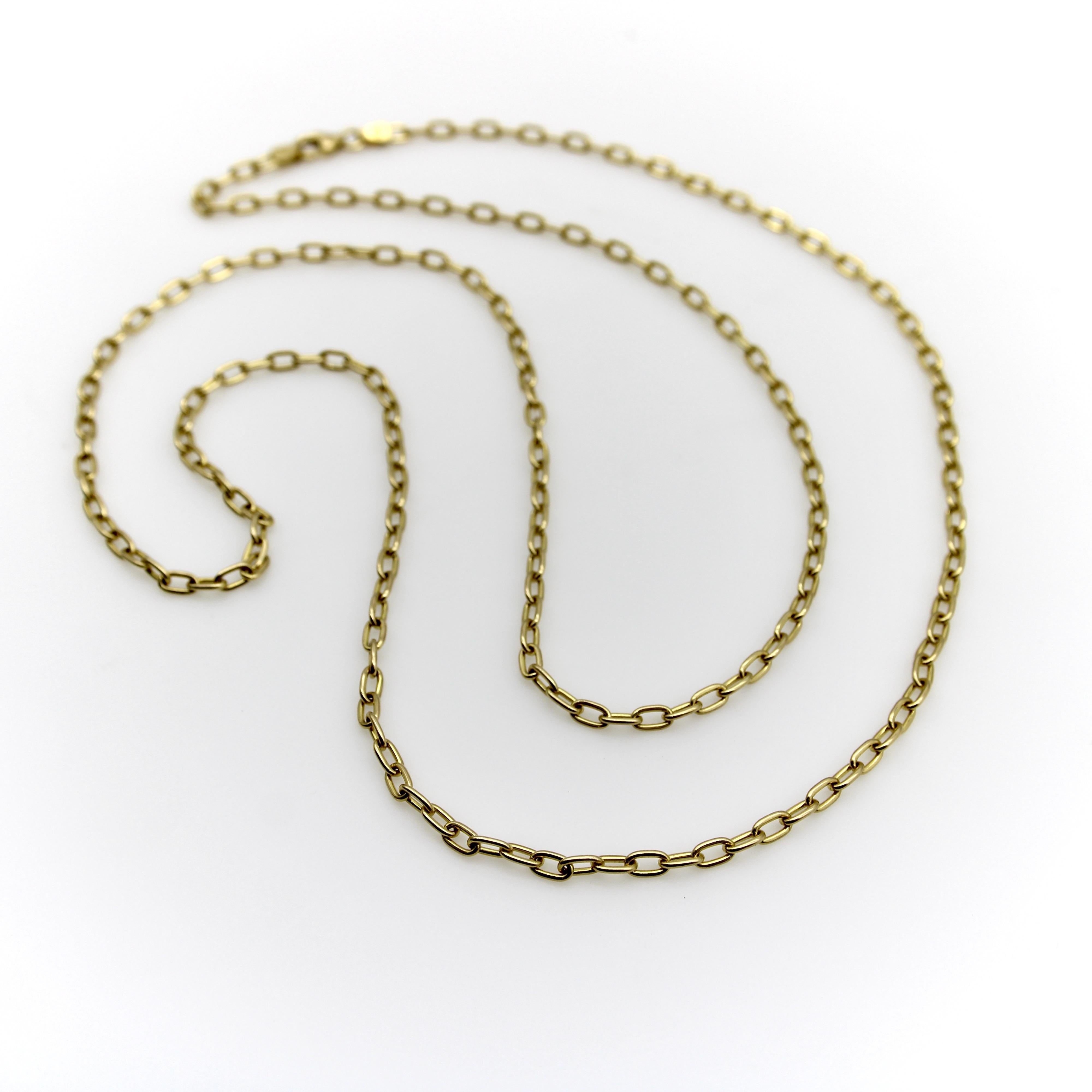 This 18k gold chain consists of nice, open oval links. At 30” in length, the chain hangs mid-sternum, a great length for stacking with other necklaces; the width of the chain gives it presence and allows the chain to pair nicely with larger pendants