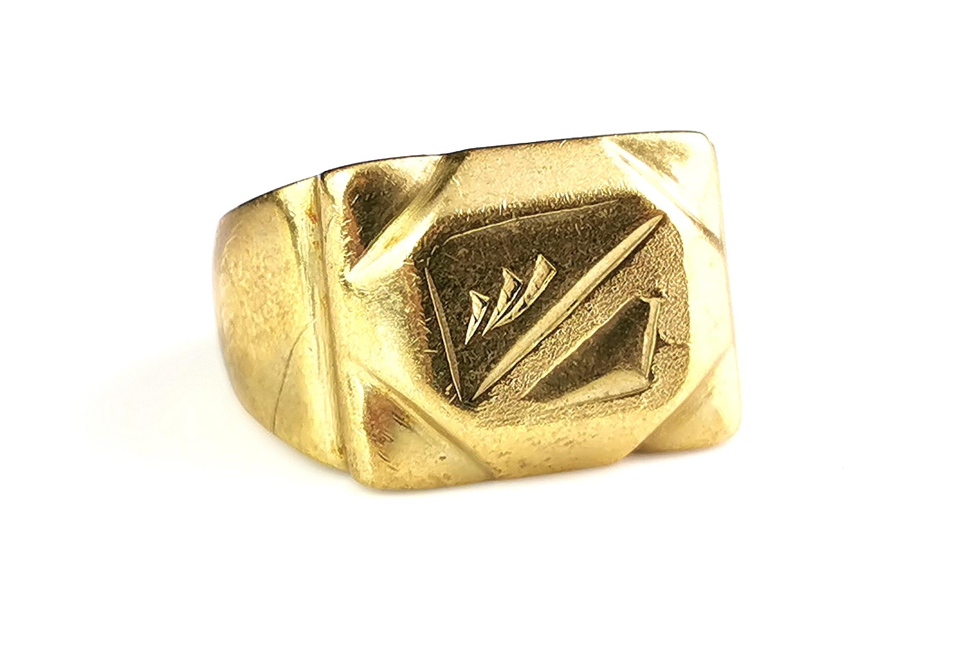 A fantastic vintage c1970s gold plated signet ring.

All the chunky and heavy features of a gold signet ring in a rich 18ct gold plating.

It has a decorative engraving to the front and slight engraved recess to the shoulders.

It is very heavy so