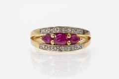 Vintage 18k gold ring with natural rubies and diamonds, France.
