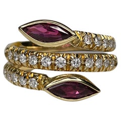 Modern 18 Karat Gold Marquise Cut Ruby 0.31 Carat Diamond Toi Et Moi Ring