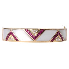 Bracelet vintage en or 18K incrusté de rubis, de diamants et de nacre  12.20ct Rubis