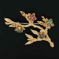 Spilla d'epoca in oro 18 carati con rubino, smeraldo, zaffiro e turchese, a forma di ramo strutturato