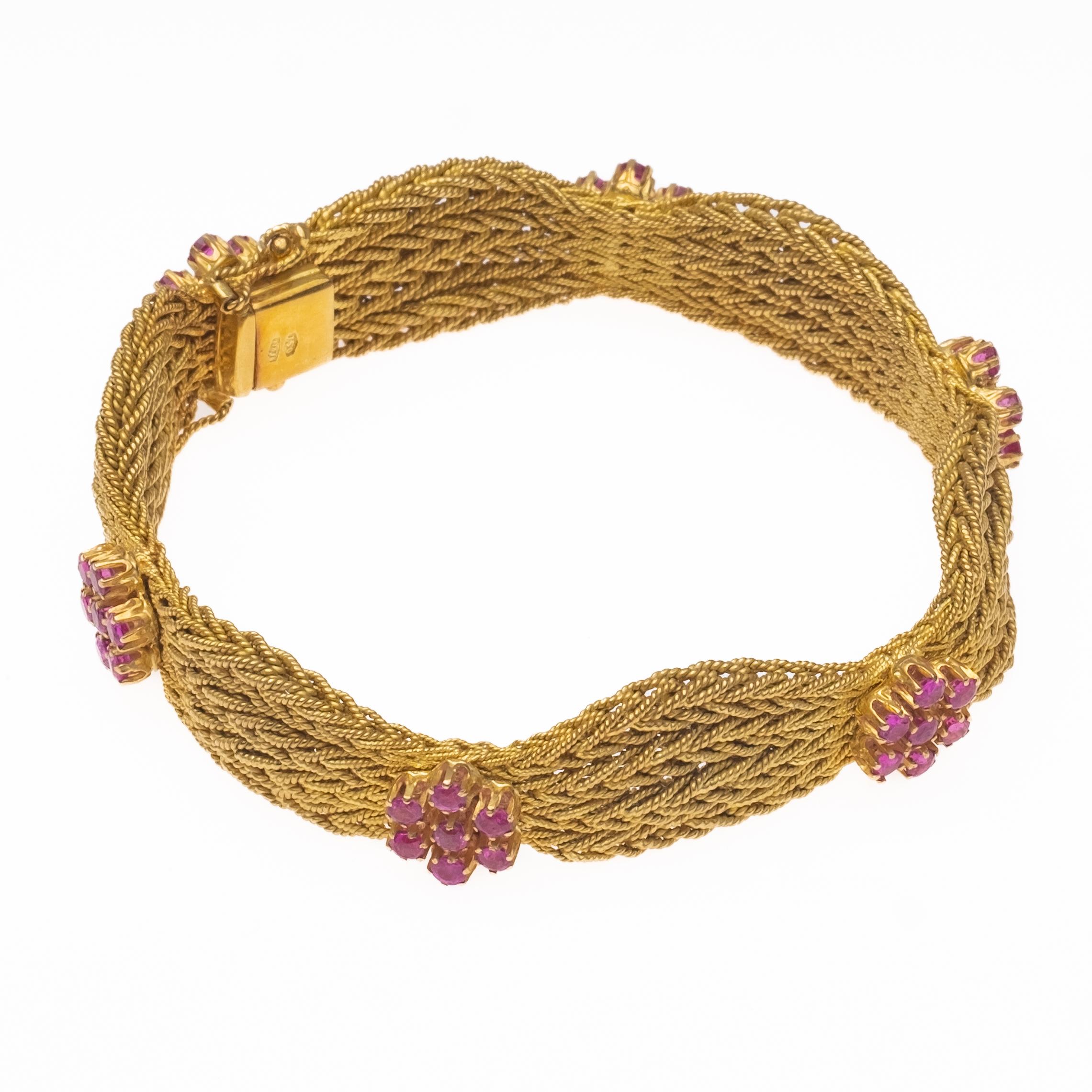FINE ESTATE 18K GOLD AND Ruby Bracelet. One lady's 18k yellow gold, 7 inch long, fashion bracelet designed with tapering 