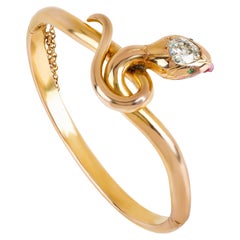 Vintage 18K Gold Snake Bracelet with Diamond, Ruby and Emeralds