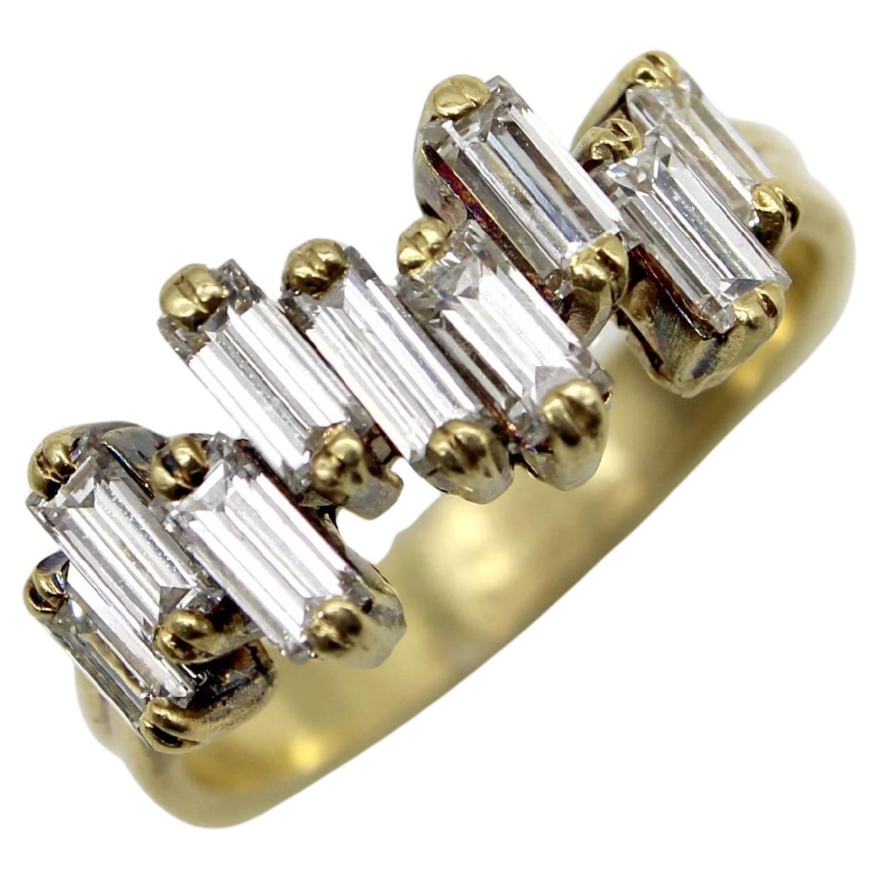 Anillo vintage de diamantes baguette escalonados de oro de 18 quilates