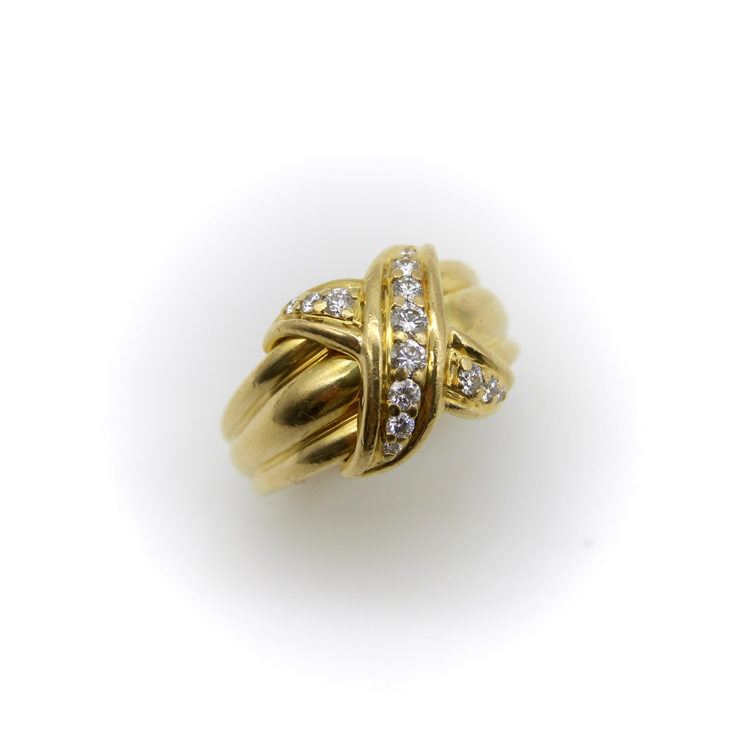 Tiffany & Co.’s signature classic “X” ring was designed by Jean Schlumberger, who famously described his aesthetic by saying “I try to make everything look as if it were growing, uneven, at random, organic, in motion.” In this 18k gold ring, a
