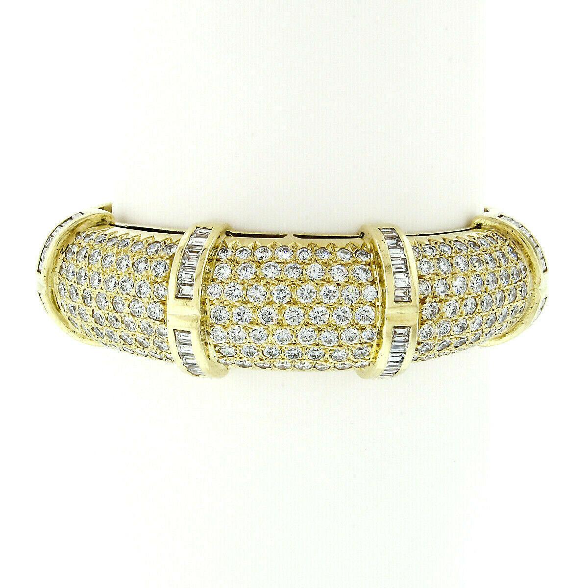 This very fine quality diamond bangle bracelet is very well crafted in solid 18k yellow gold and features 9.08 carats of fiery and brilliant diamonds, neatly and perfectly pave set across its dome top. The wide dome top is completely drenched with