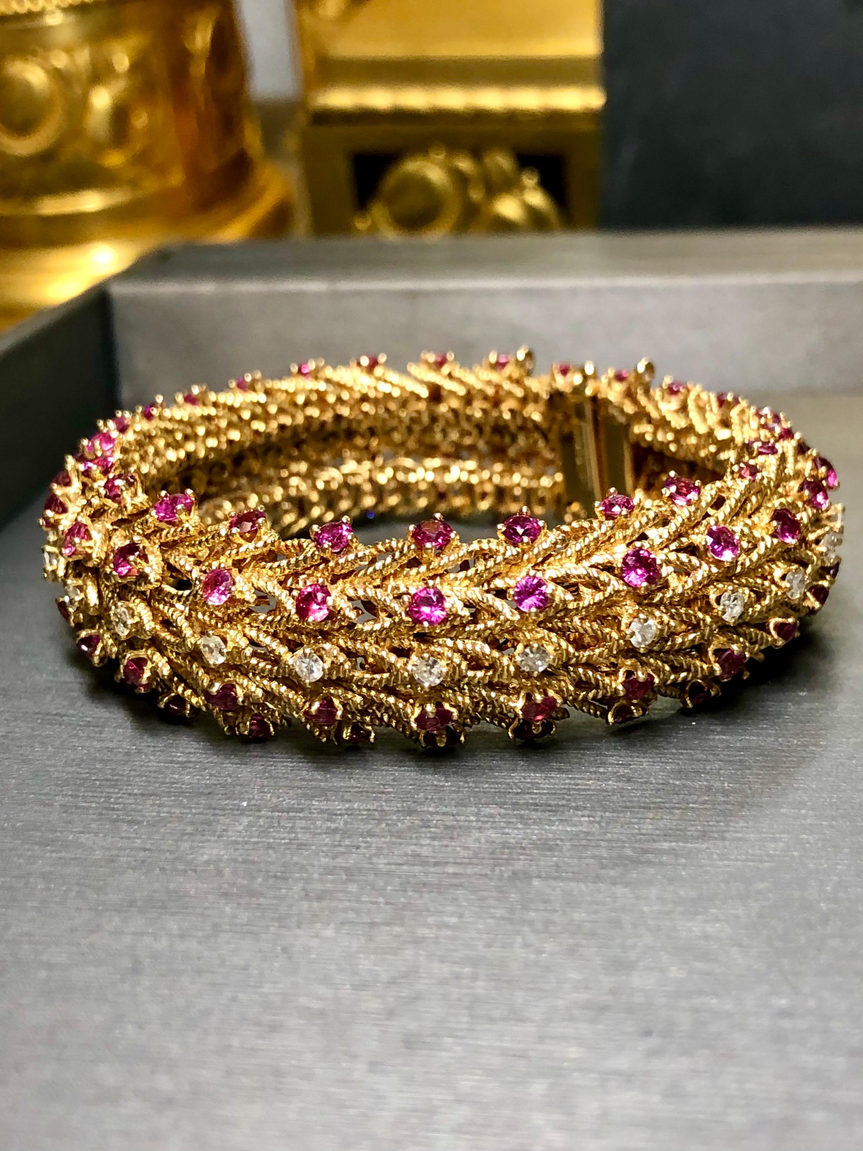 
A gorgeous vintage bracelet done in deep18K yellow gold set with approximately 15.60cttw in natural rubies and .78cttw in G-I color Vs clarity round diamonds. The quality in its construction is that of a bygone era not commonly seen in today’s