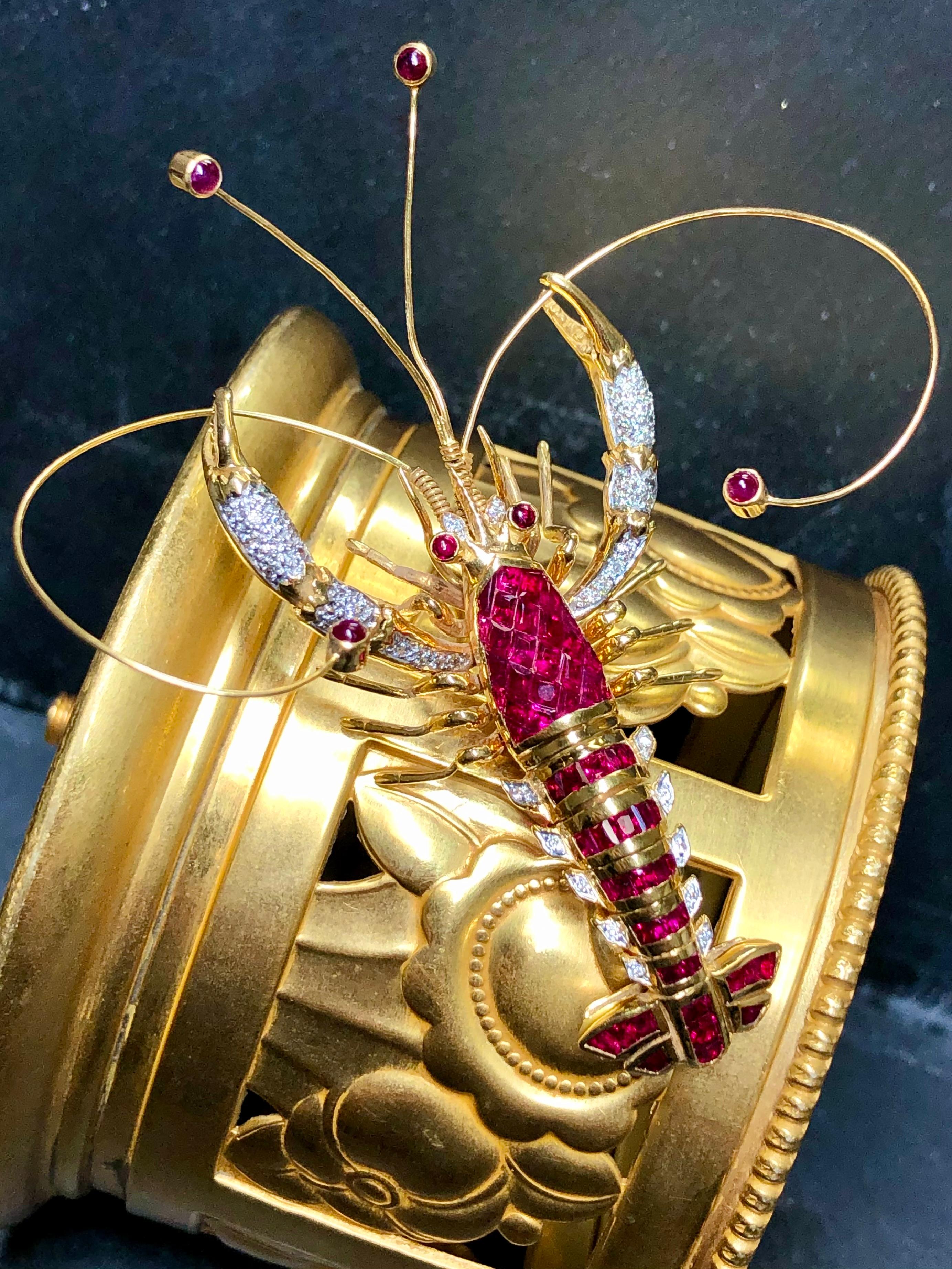 
If you have ever wanted the rarest piece from Le Vian, well here you are. This is the coveted lobster brooch in the largest size done in 18K yellow gold with perfectly matched invisible set rubies and diamonds. It features articulating pincers and