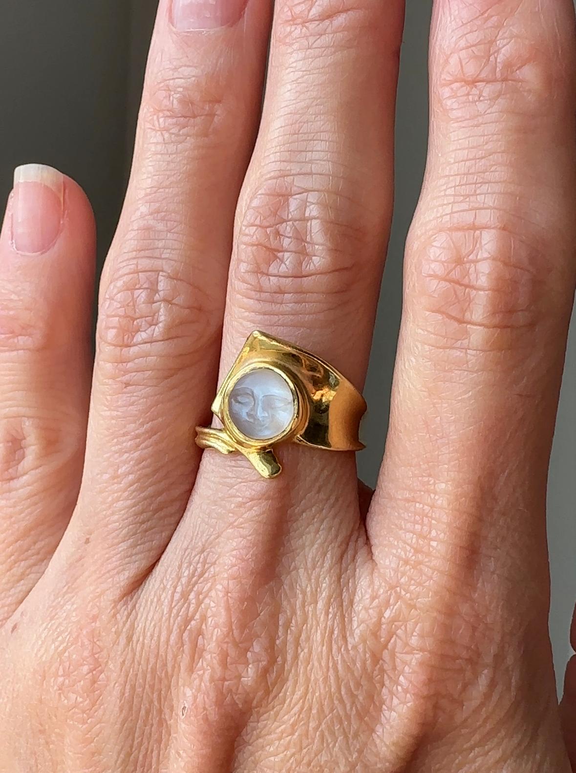 Both luminous and beautifully carved this whimsical vintage man-in-the-moon ring is something special. 🌙 The hand carved Ceylon moonstone is transparent with a magical blue luster mounted in a bespoke 18k yellow gold setting crafted by Skylight